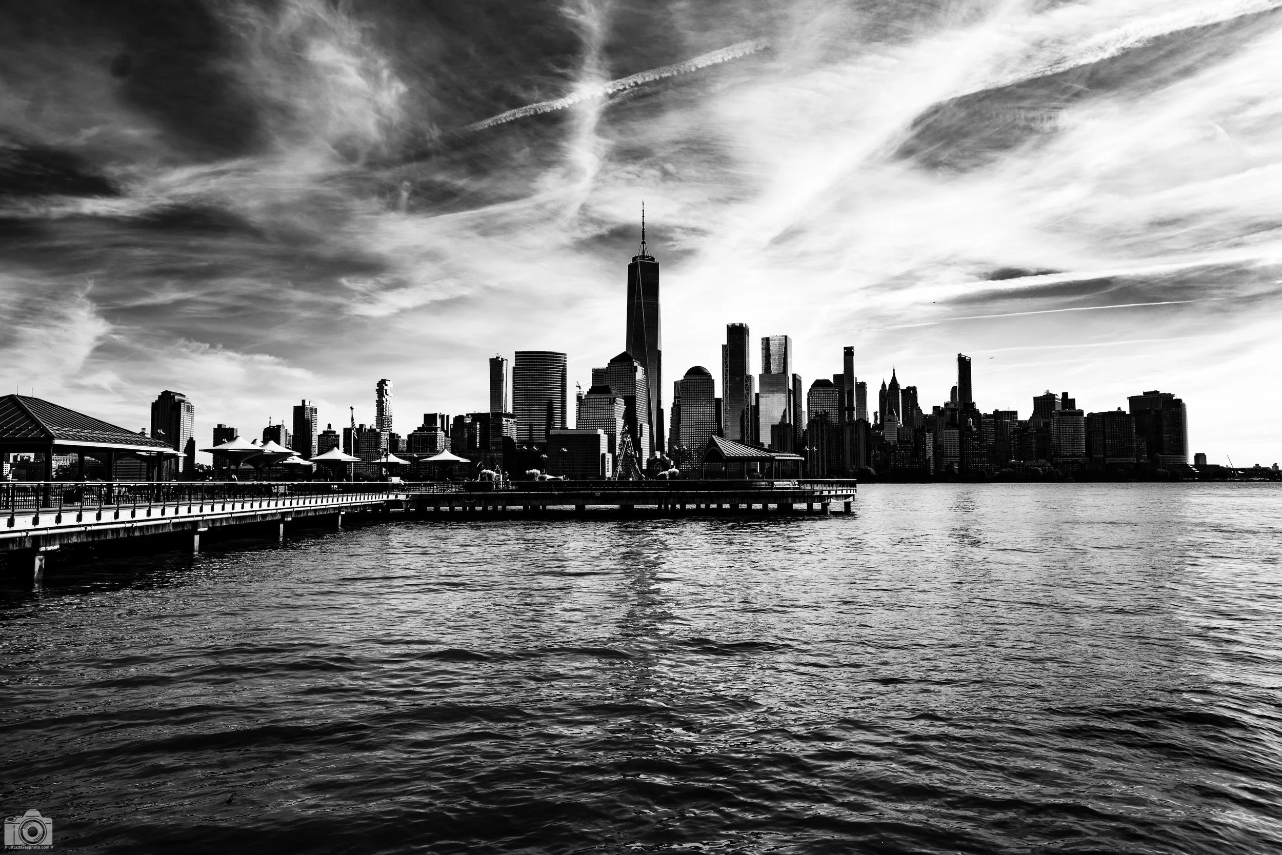 2024 - NYC from the Bay.  I found this G lens not to be very building friendly unless you shot from afar.  It's an ultrawide lens that gives a fisheye vibe as you will see in some of the shots. Shot with a Sony a7c II // FE 12-24mm G @ 24mm f/4 ISO 5