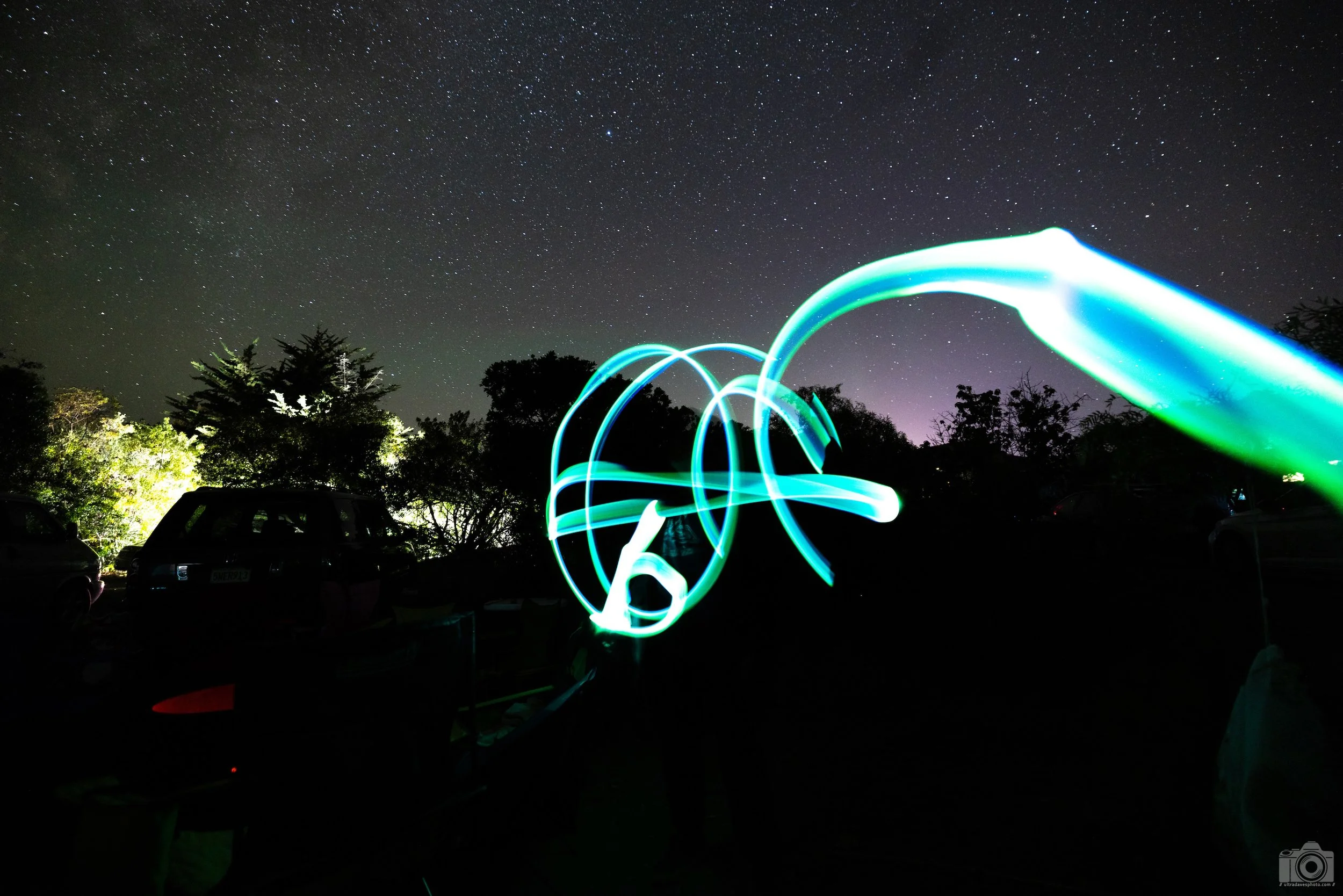 2021 - Glowsticks.  El Capitan State Beach, CA Campground.  Forest like surrounding above the beach.  It's a great place to camp and they have running water & showers!  Shot with a Canon EOS R5 // RF 15-35mm f2.8L ISO 800 - 25s.  Mounted on a mini Ma