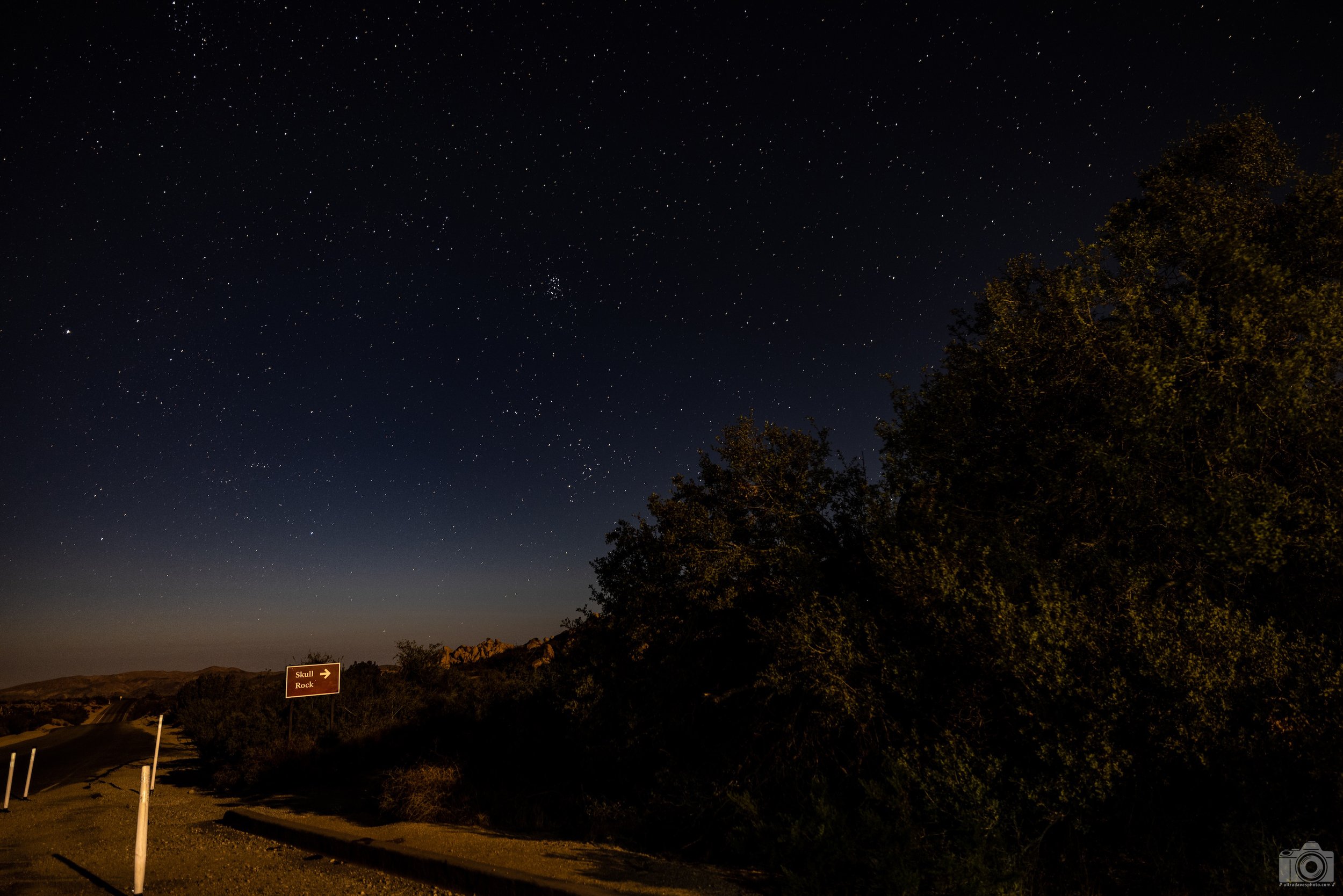2021 - Skull Rock entryway sign.  The moon was very bright this night.  Canon EOS R5 // RF 15-35mm @ 32mm f/2.8 ISO 400 - 15s.  Tripod mounted.