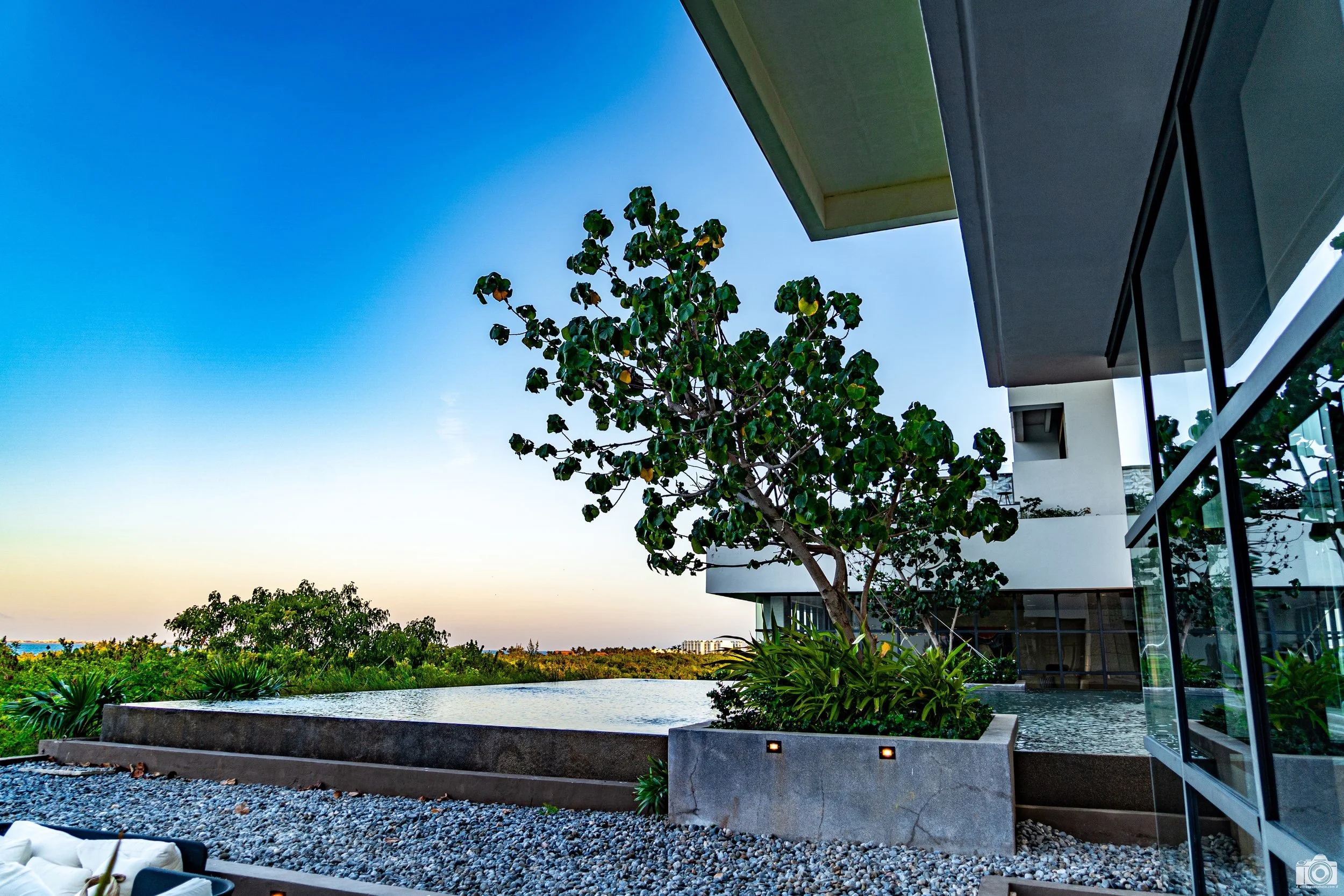 Outside the Bar.

Upon entry you are greeted with the Don Fernando Lobby Bar with a nice selection of spirits.  But a few steps beyond will take you to this beautiful outdoor space.  From this spot you get the view of the resort shown in the previous