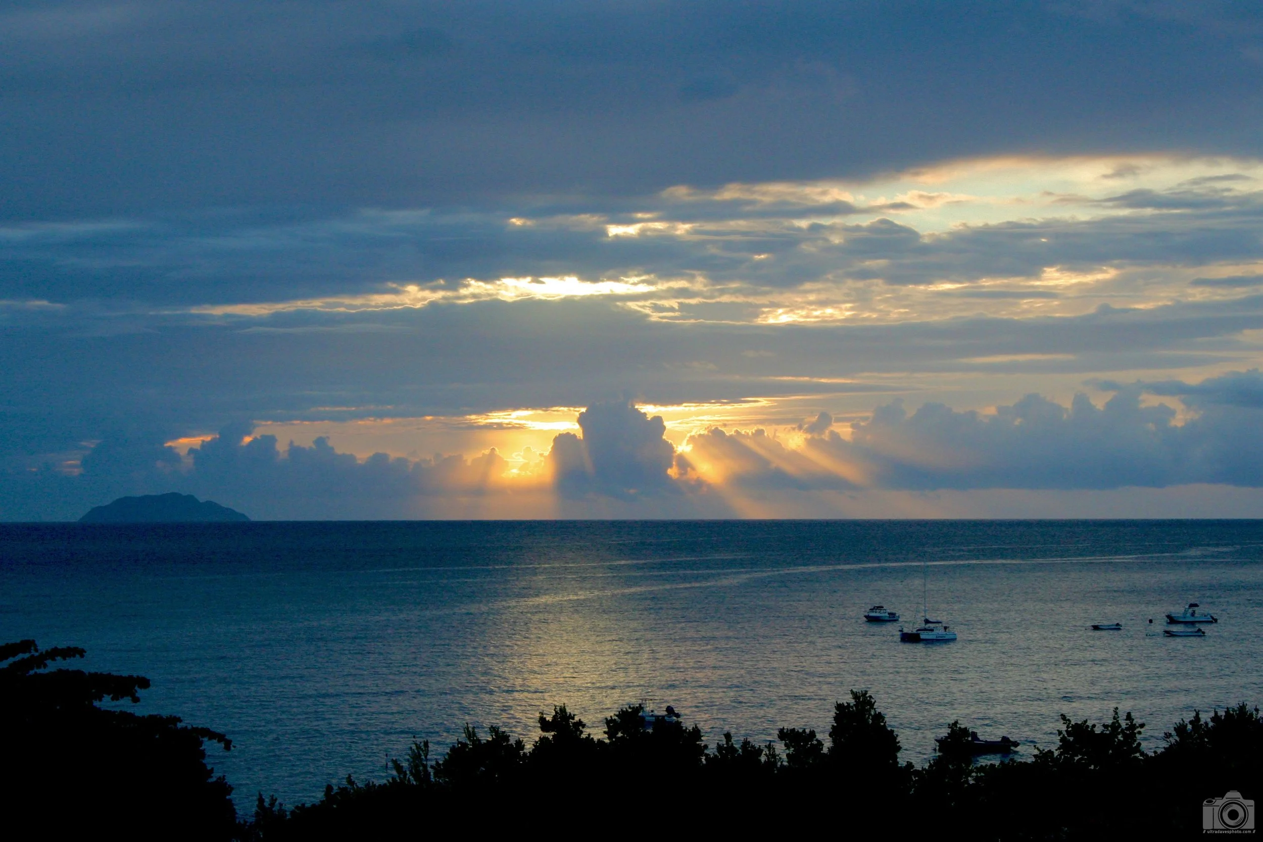 2009 - Sun Setting on the Caribbean Sea.  Ponce, Puerto Rico.  Shot with a Canon Digital Rebel XT // EF 18-55mm @ 55mm f11 ISO 800 - 1/250s.
