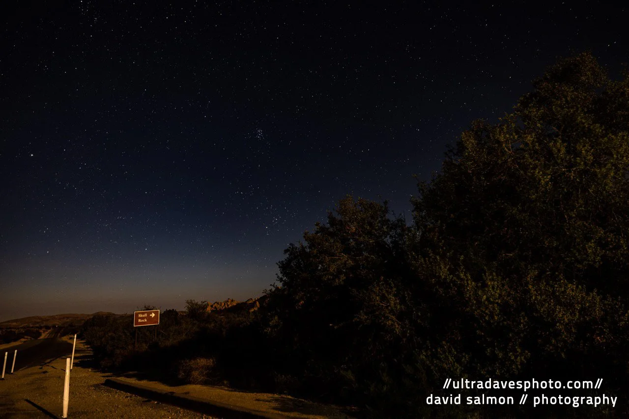 2021 - Skull Rock entryway sign. The moon was very bright this night. Canon EOS R5 // RF 15-35mm @ 32mm f/2.8 ISO 400 - 15s. Tripod mounted.