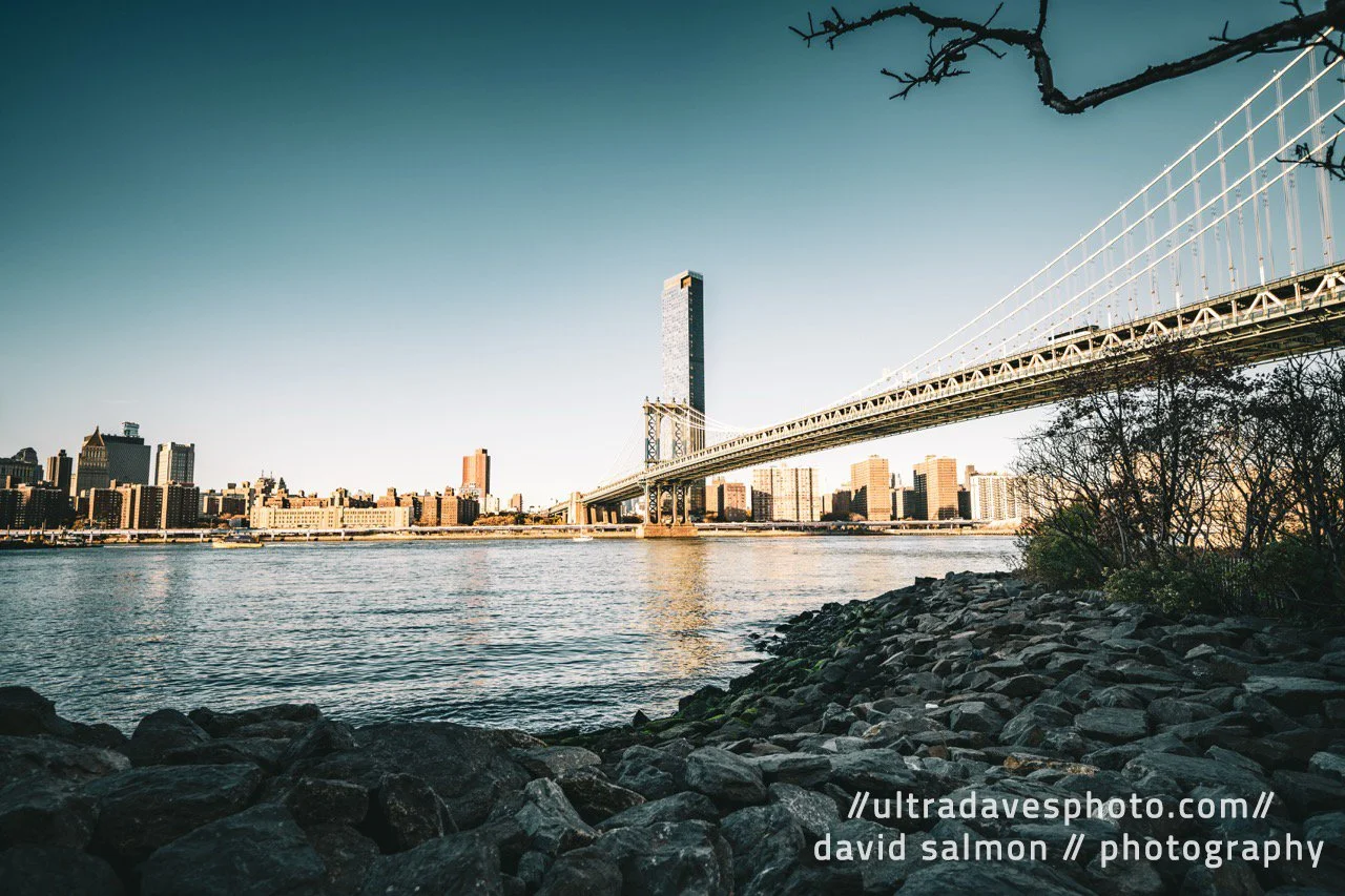 Manhattan Bridge from Pebble Beach. Shot with a Sony a7c II // FE 12-24mm G @ 19mm f/4 ISO 100 - 1/400s.