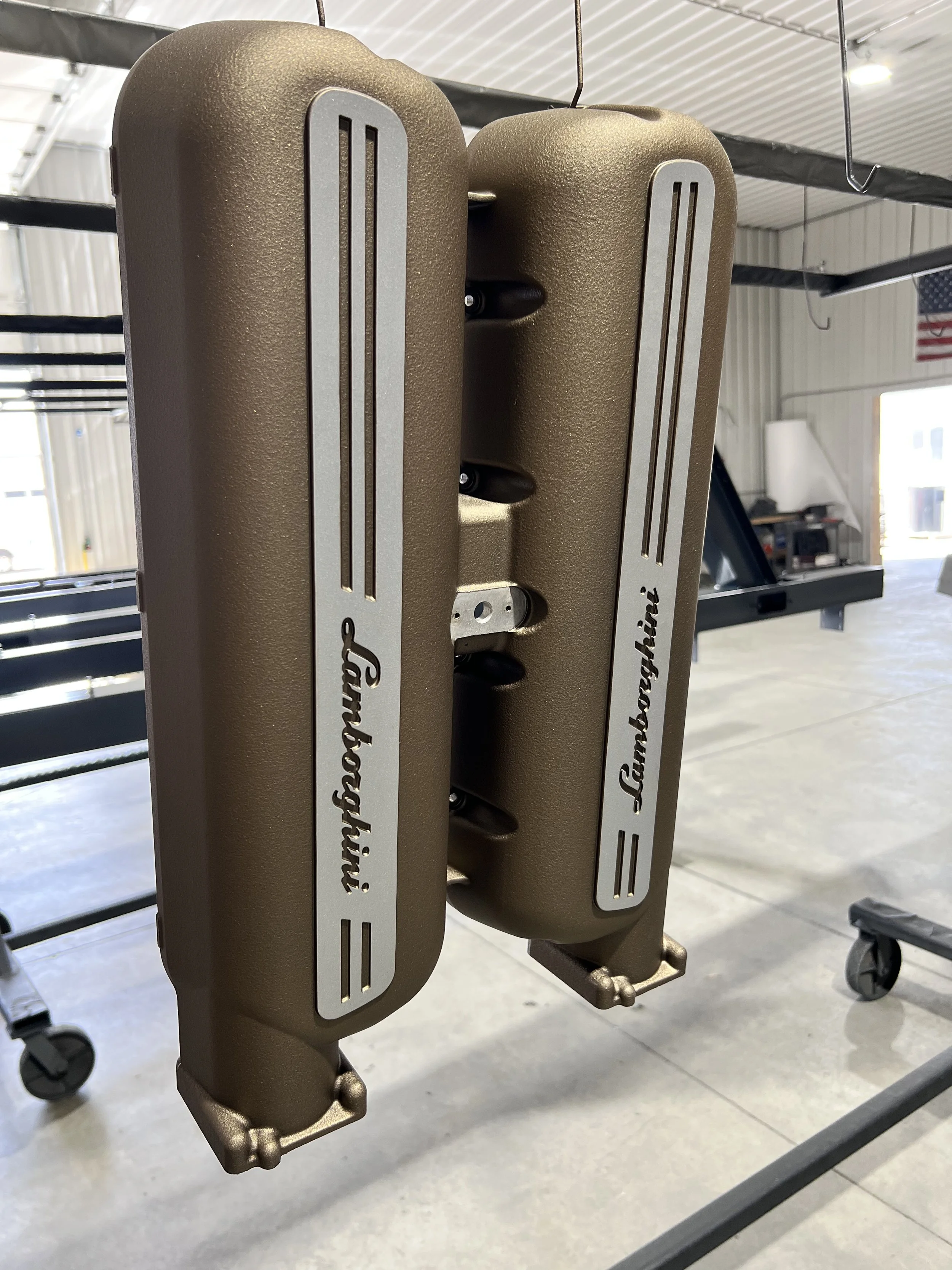 Close-up of a Landpower brand adjustable weightlifting bench in a gym.