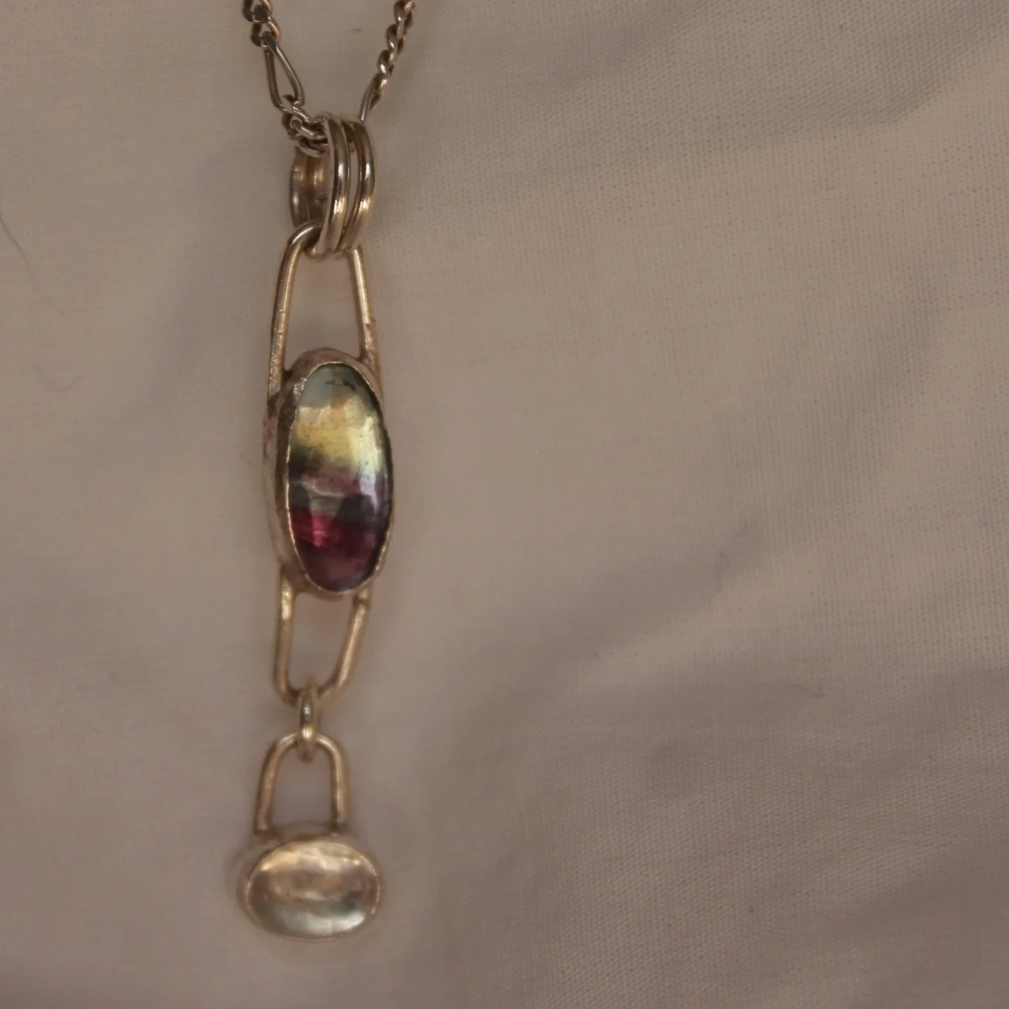 if a fairy pooped it might look like this?? anyway - fairy drop pendant is available on my website now link in bio 💕 mispoke.au #silver #flourite #moonstone #pendant #jewellery