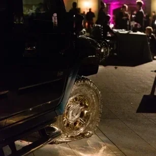 LAXART Gala Greystone Mansion GOLD FLAT TIRE called "Untitled Hummer Flat" featured at the 2014 LAXArt Gala at Greystone Mansion was Ry Rocklen