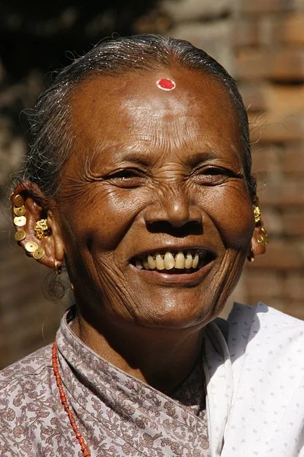 A Duchenne smile (image from Wikipedia).
