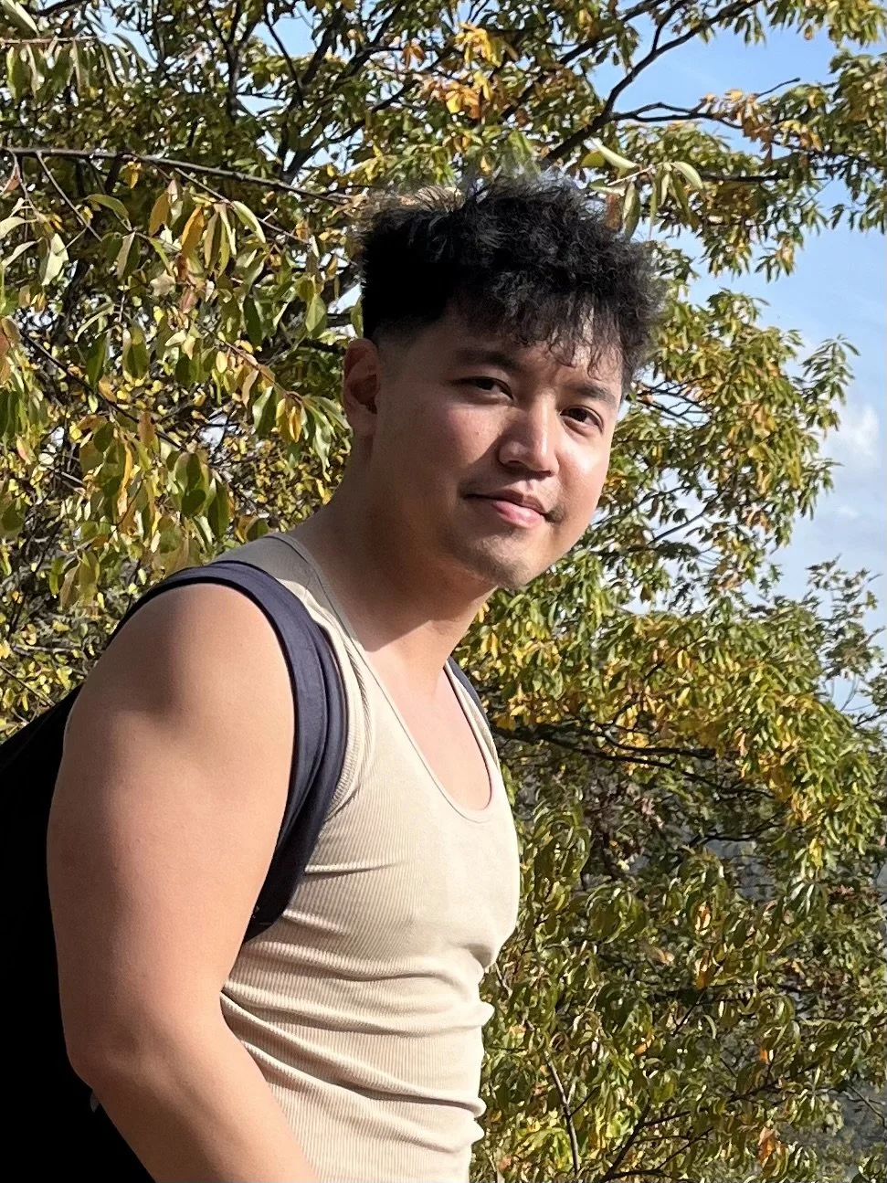 Headshot of author Xuan W. Tay