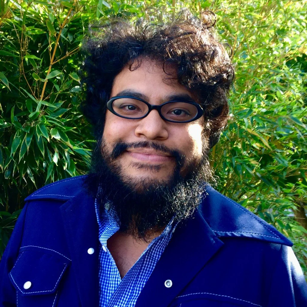 Headshot of author RI RI