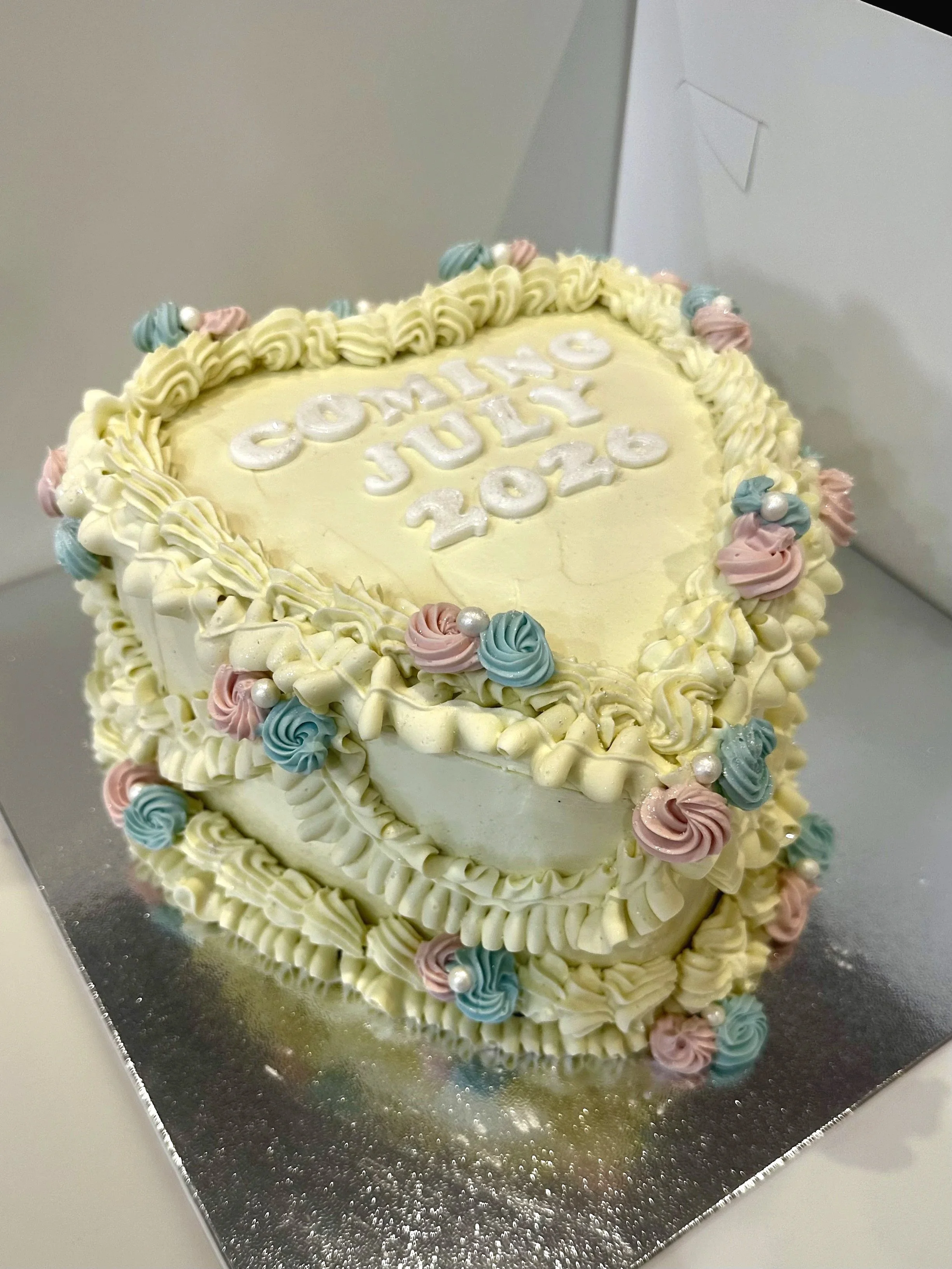 gender reveal vanilla heart cake