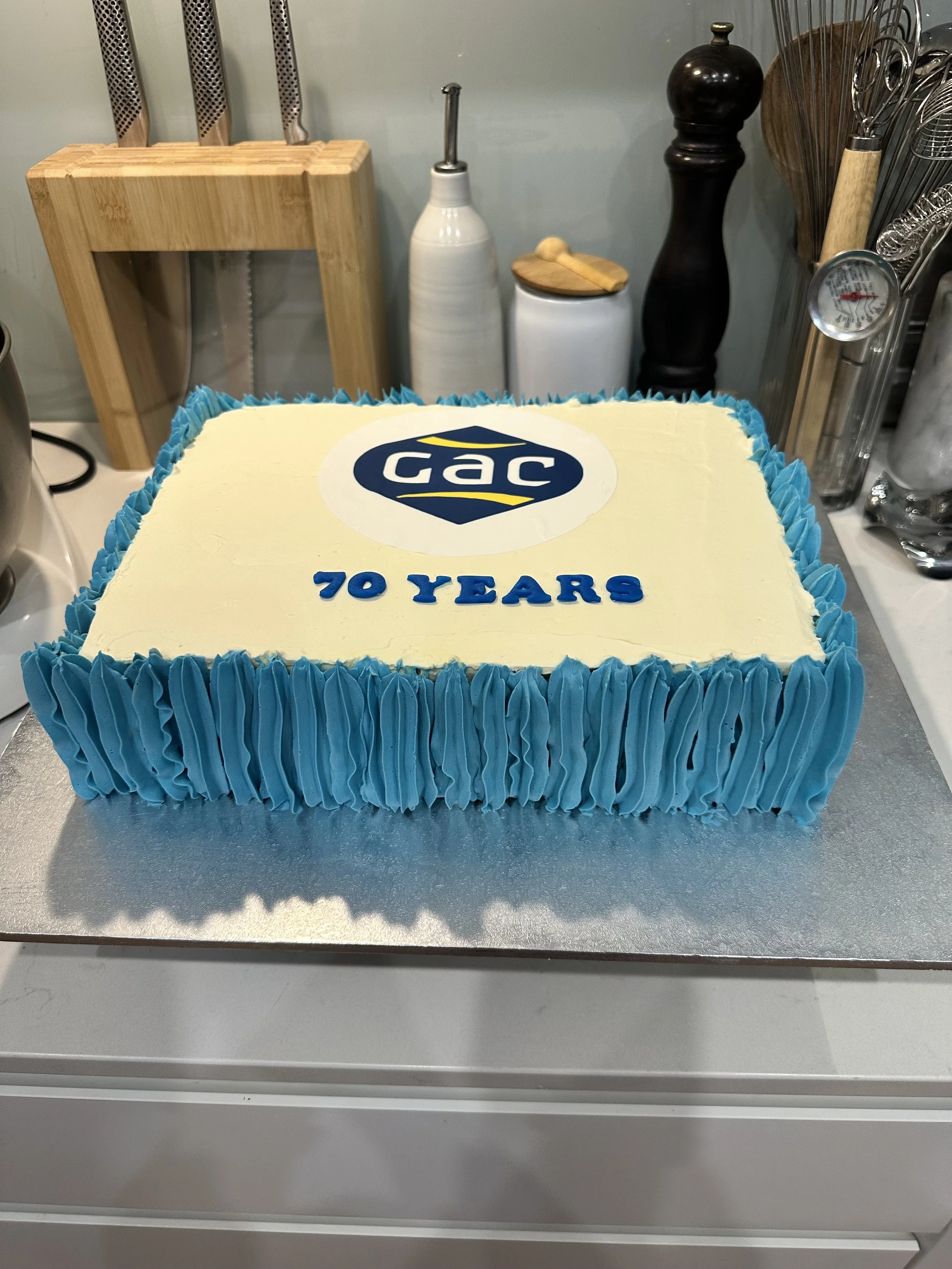 corporate vanilla and raspberry celebration cake