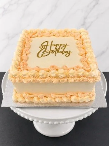 Lemon and Poppyseed Cake with Vanilla Buttercream and Lemon Curd Layers