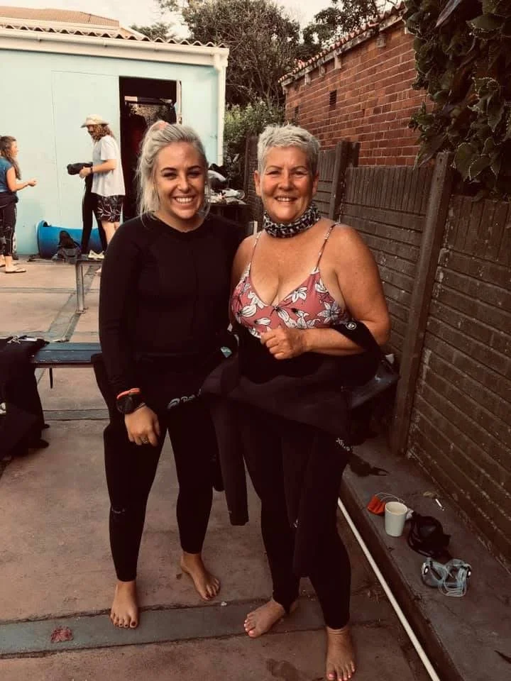 Two divers getting ready to go diving