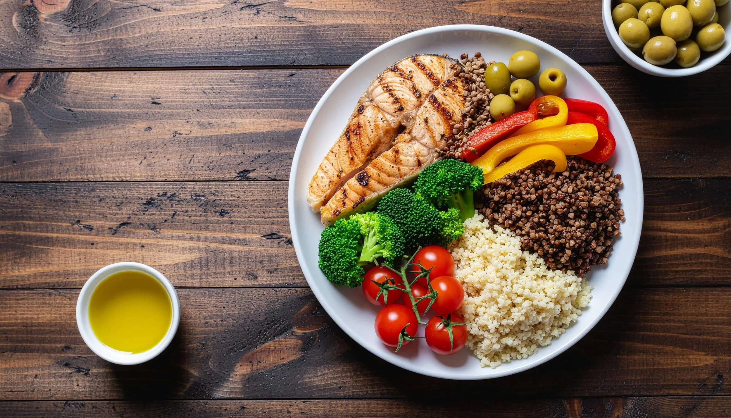 Mediterranean diet foods including vegetables, olive oil, fish and whole grains that support immune health and that may help reduce hay fever symptoms naturally.