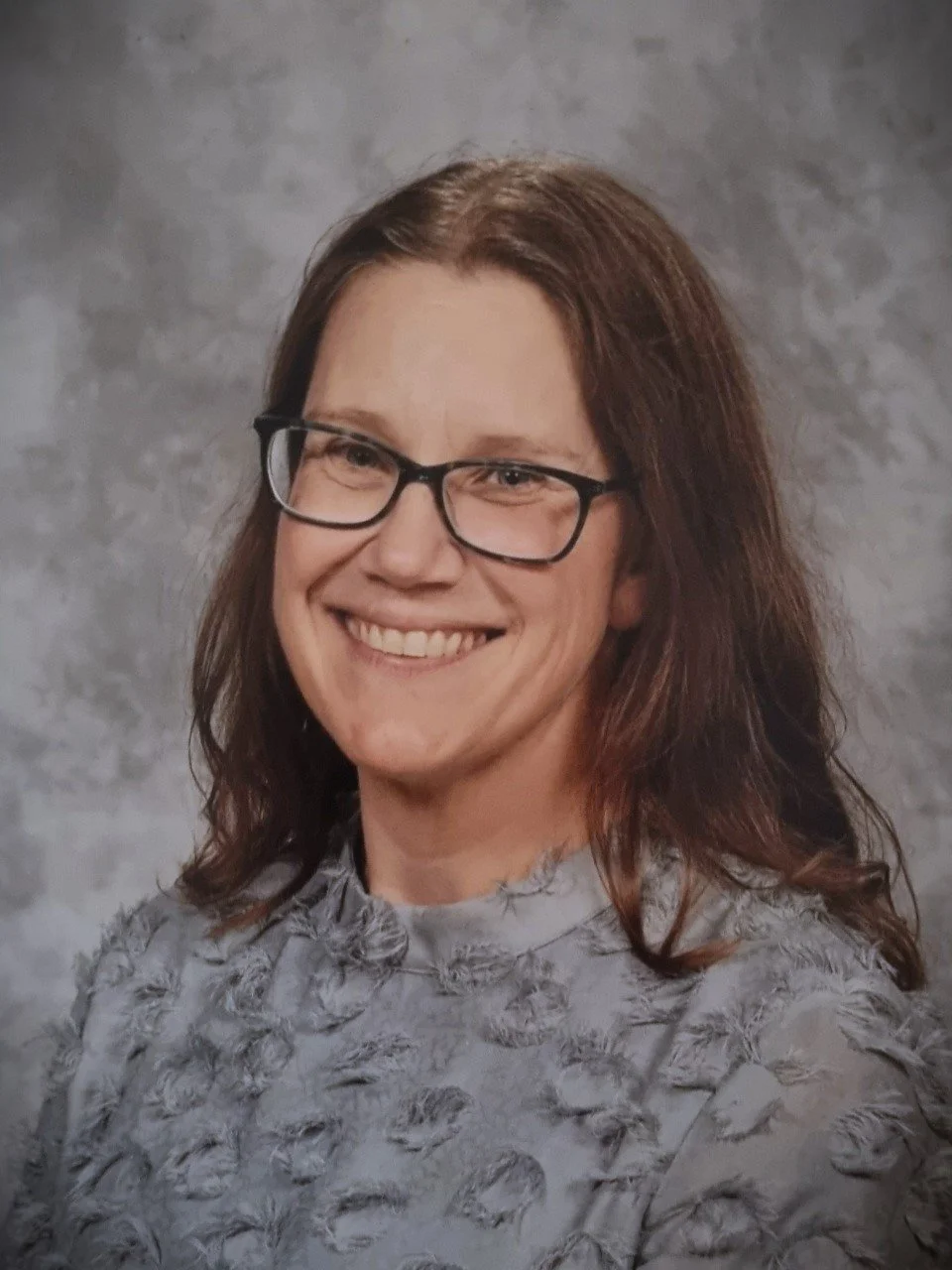 Happy and friendly smiling female teacher