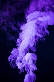 Purple and white smoke swirling against a dark background.