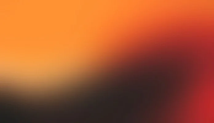 Dégradé de couleurs chaudes avec des nuances d'orange, de rouge, de jaune et de noir.