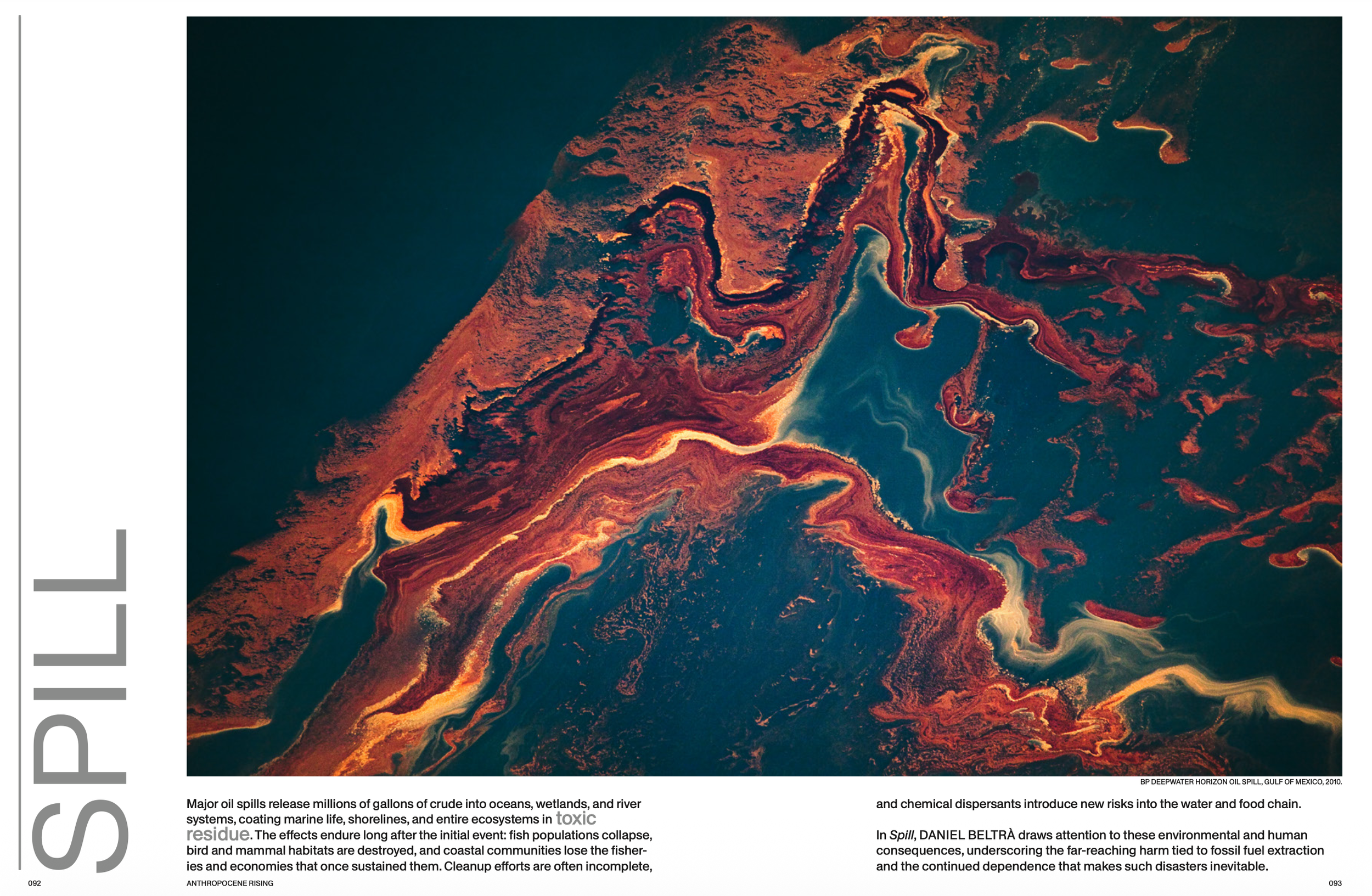 Satellite view of a Gulf of Mexico oil spill featuring swirling patterns of orange, red, and blue, caused by an offshore oil platform spill.
