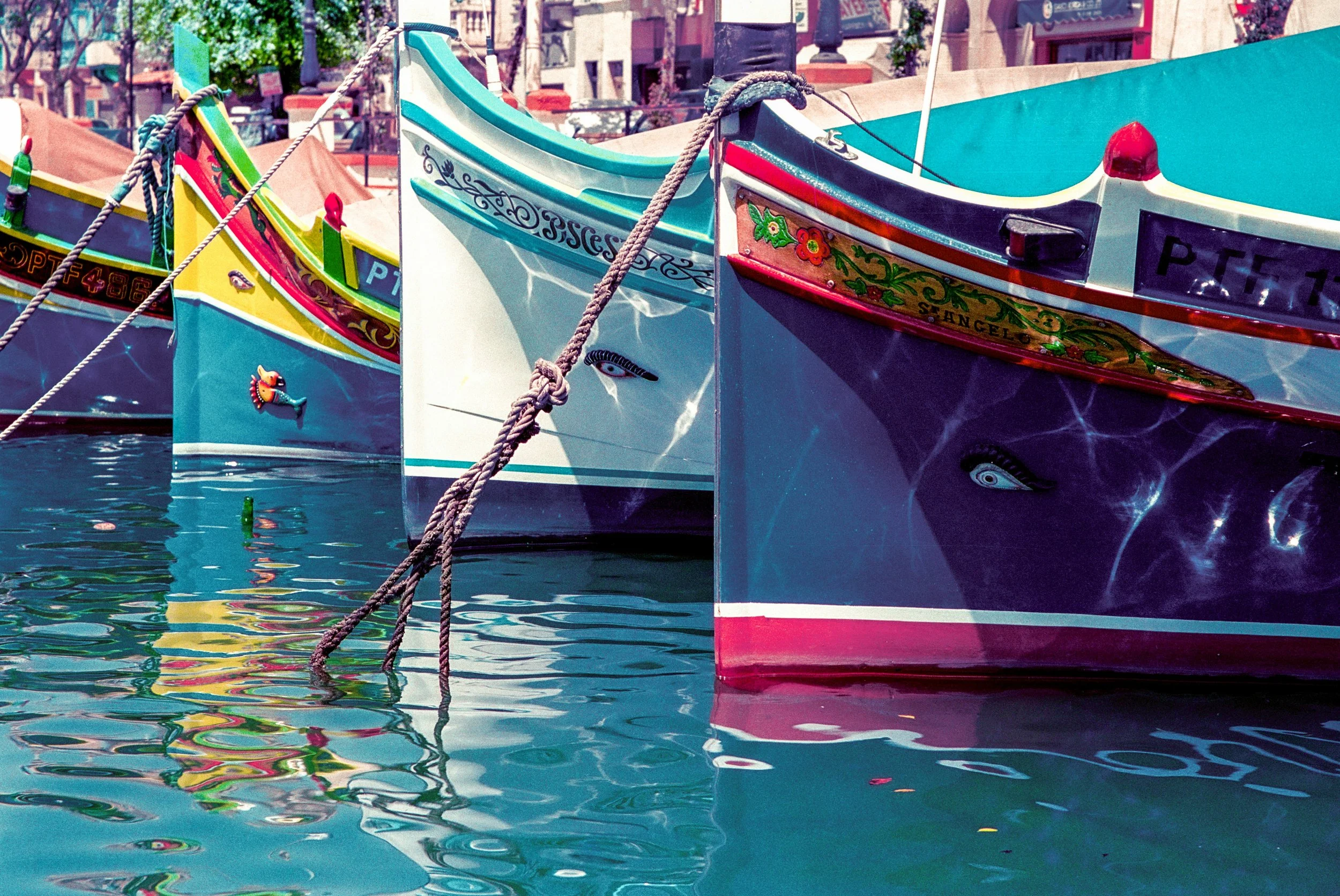 Marsaxlokk, Malta, historic Mediterranean fishing port with brightly painted luzzu boats