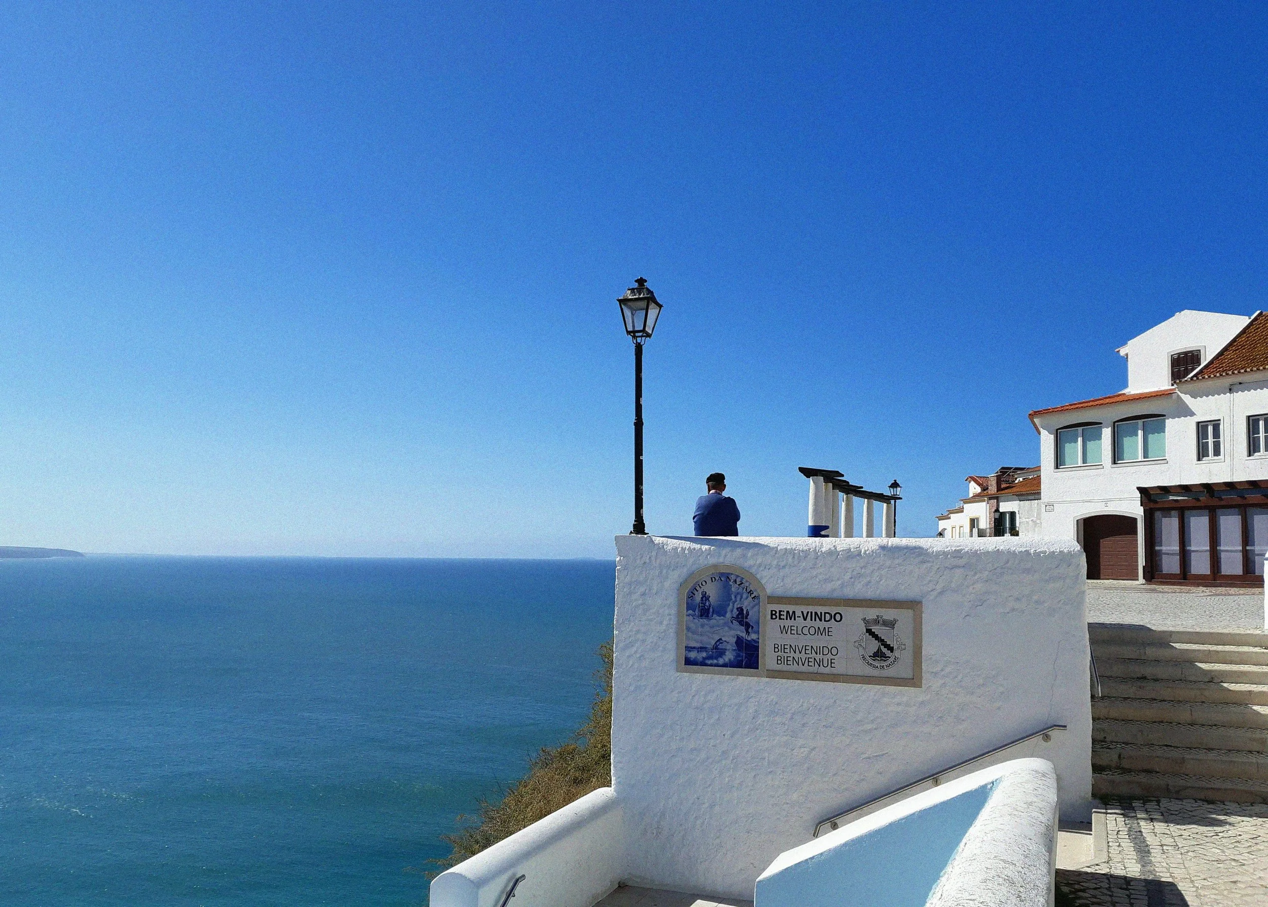 Nazaré, Portugal seaside town on the Atlantic coast, historic fishing village at sunrise, Nazaré, Portugal on the Atlantic coast, traditional fishing village with morning fish market and drying seafood