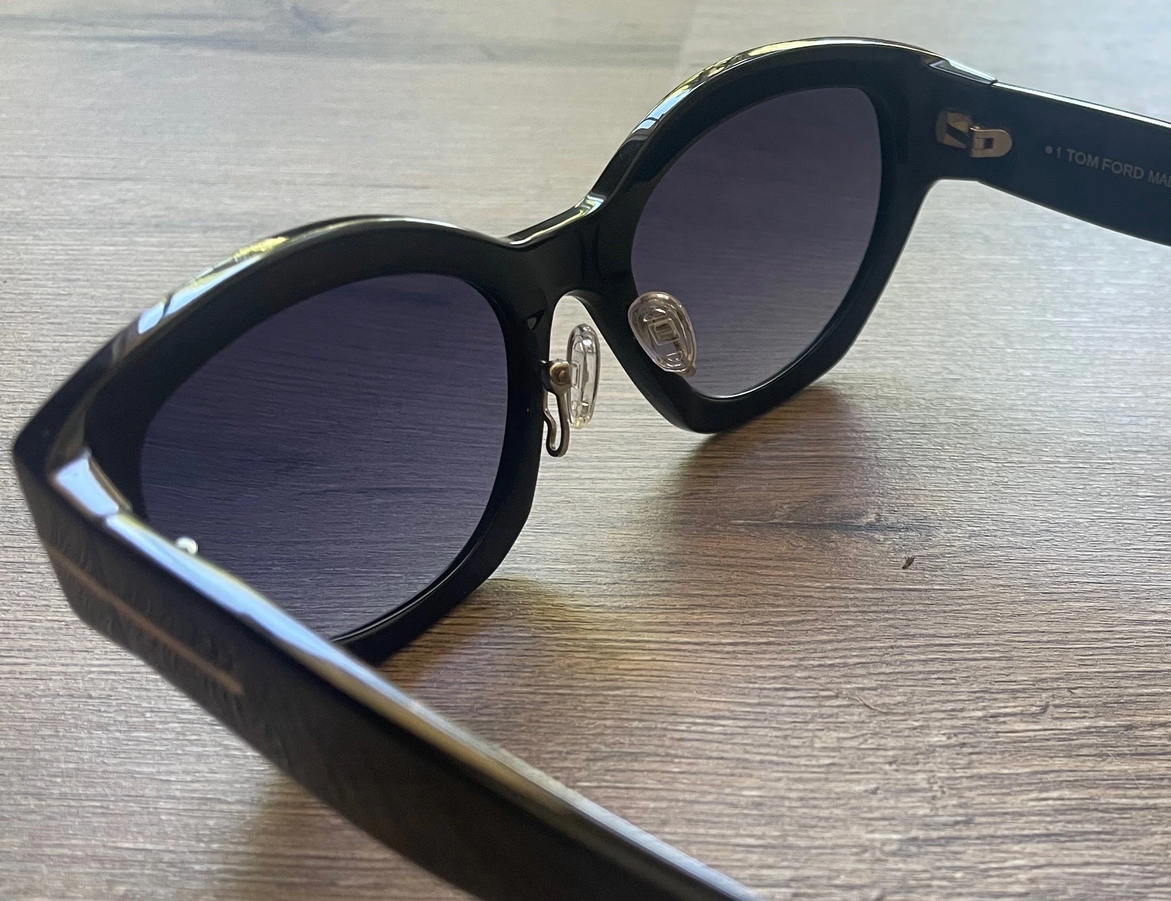 Adjustable nose pad arms fitted to Tom Ford acetate sunglasses.