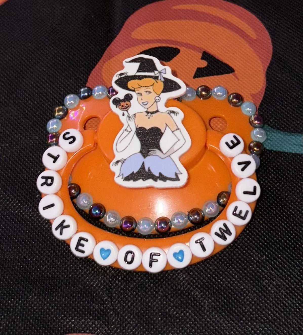 “Strike of Twelve” Glass Slipper Paci