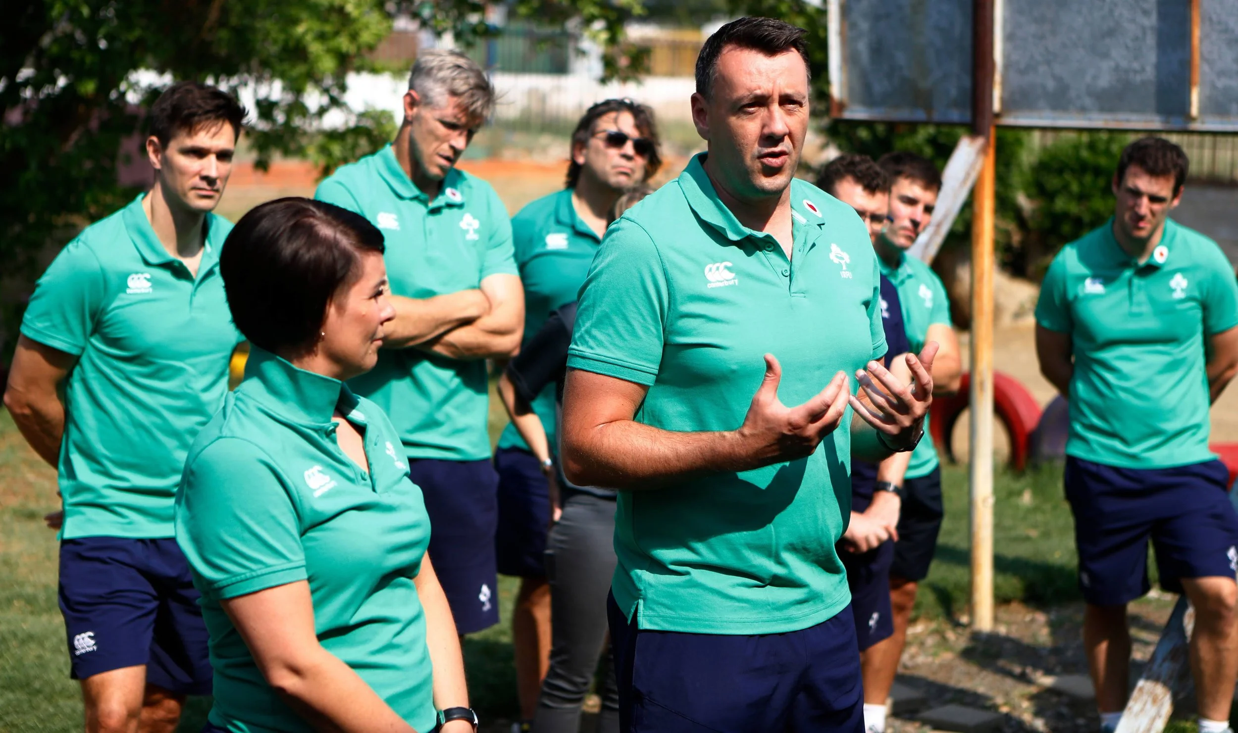 David O Siochain, team manager of Emerging Ireland Rugby XV with players and management at a community visit to an orphanage in Bloemfontein, South Africa.