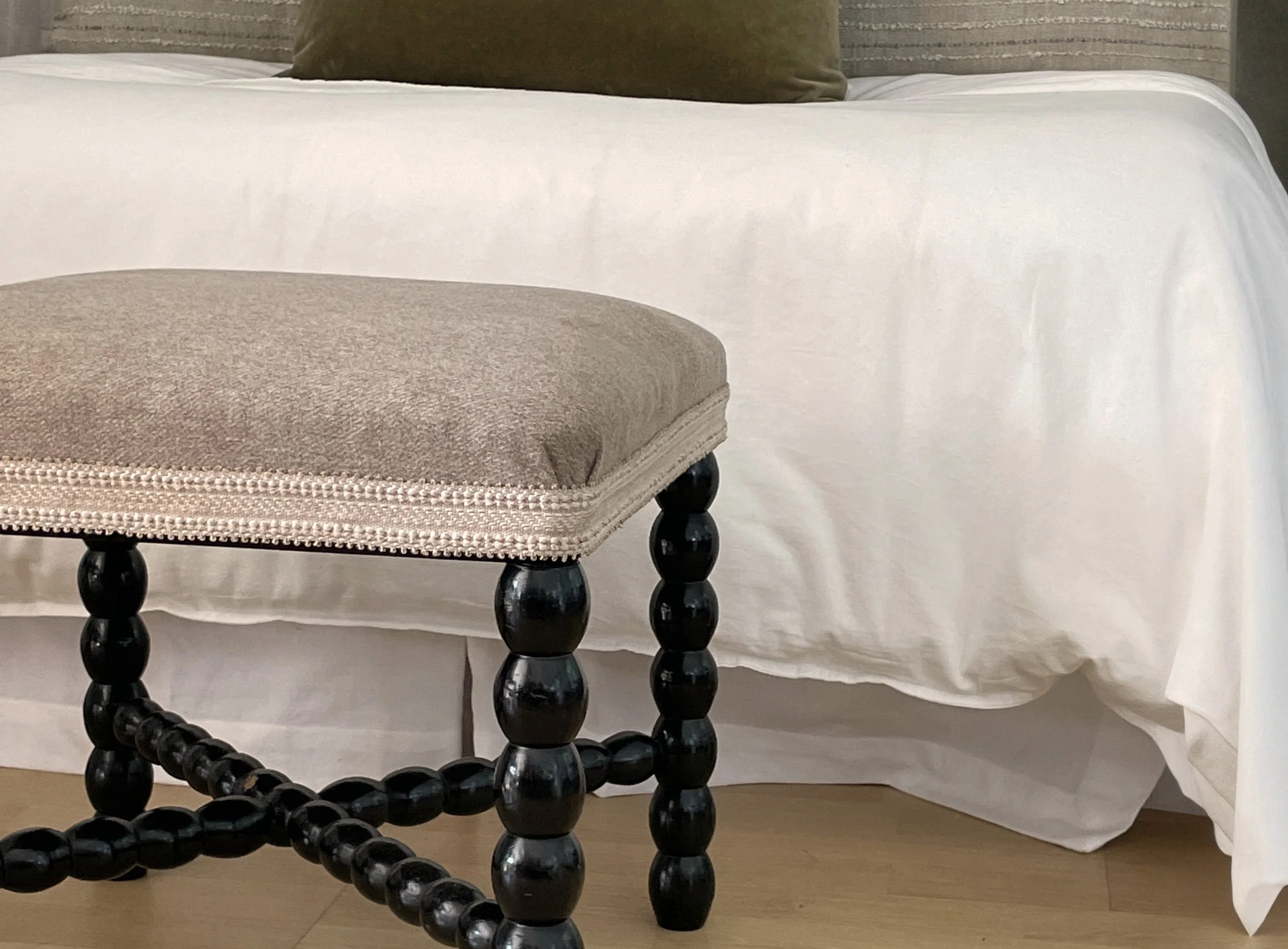 Bobbin stool upholstered in linen