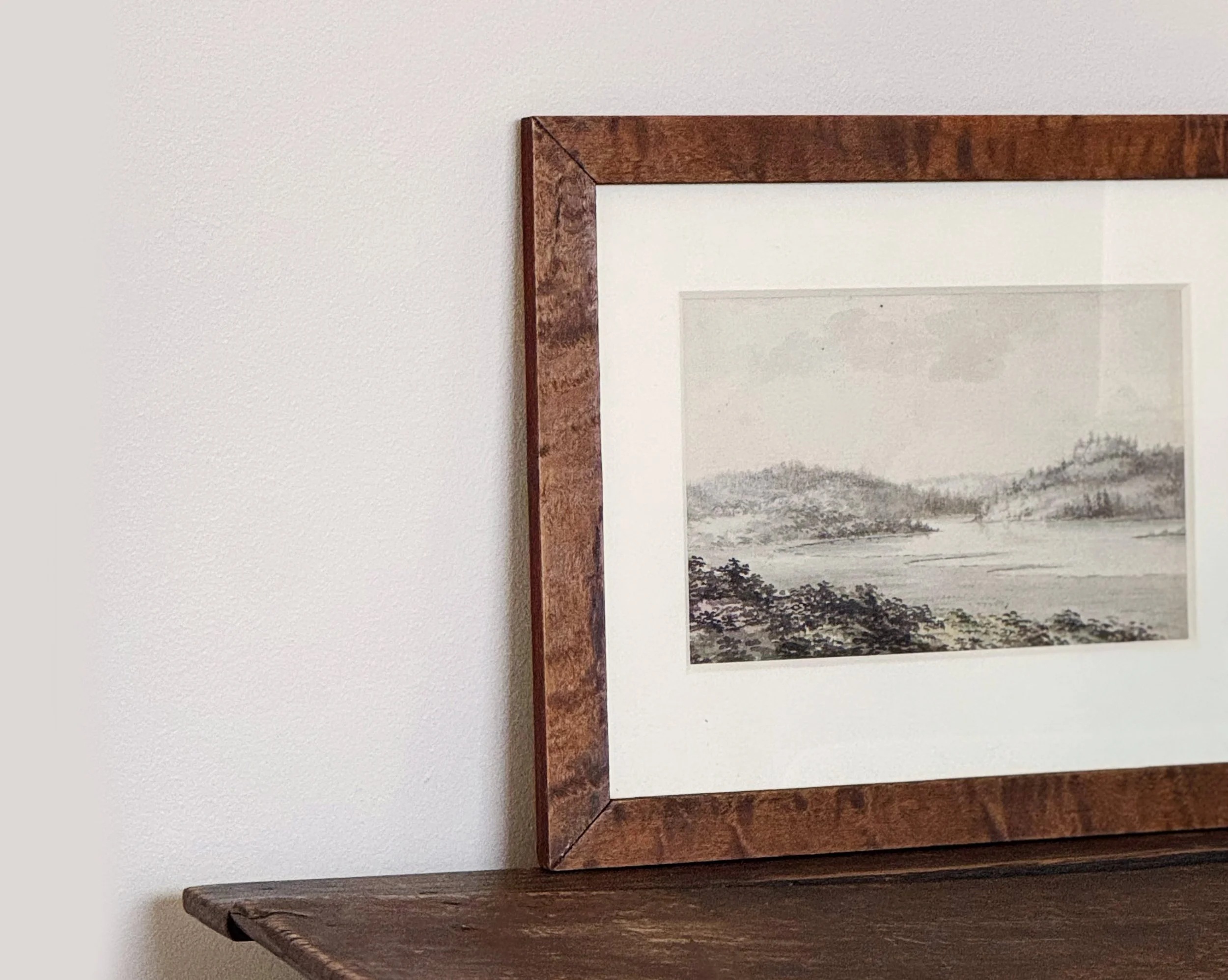 Painting in wooden frame