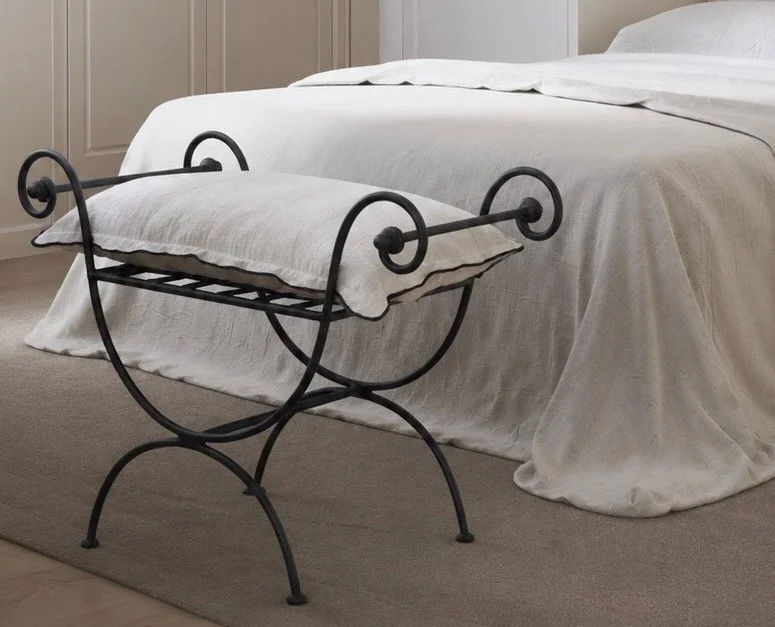 French curule-style stool in wrought iron