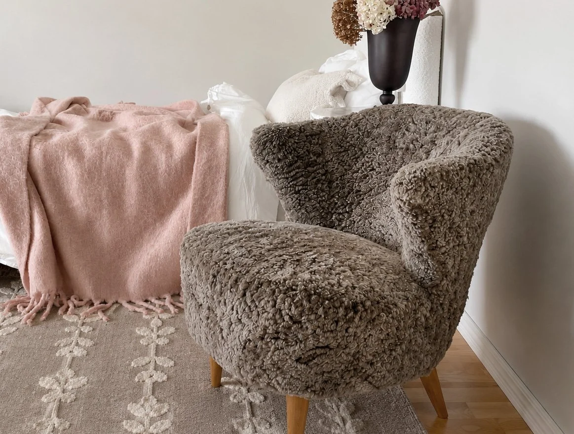 Lounge chair dressed in sheepskin