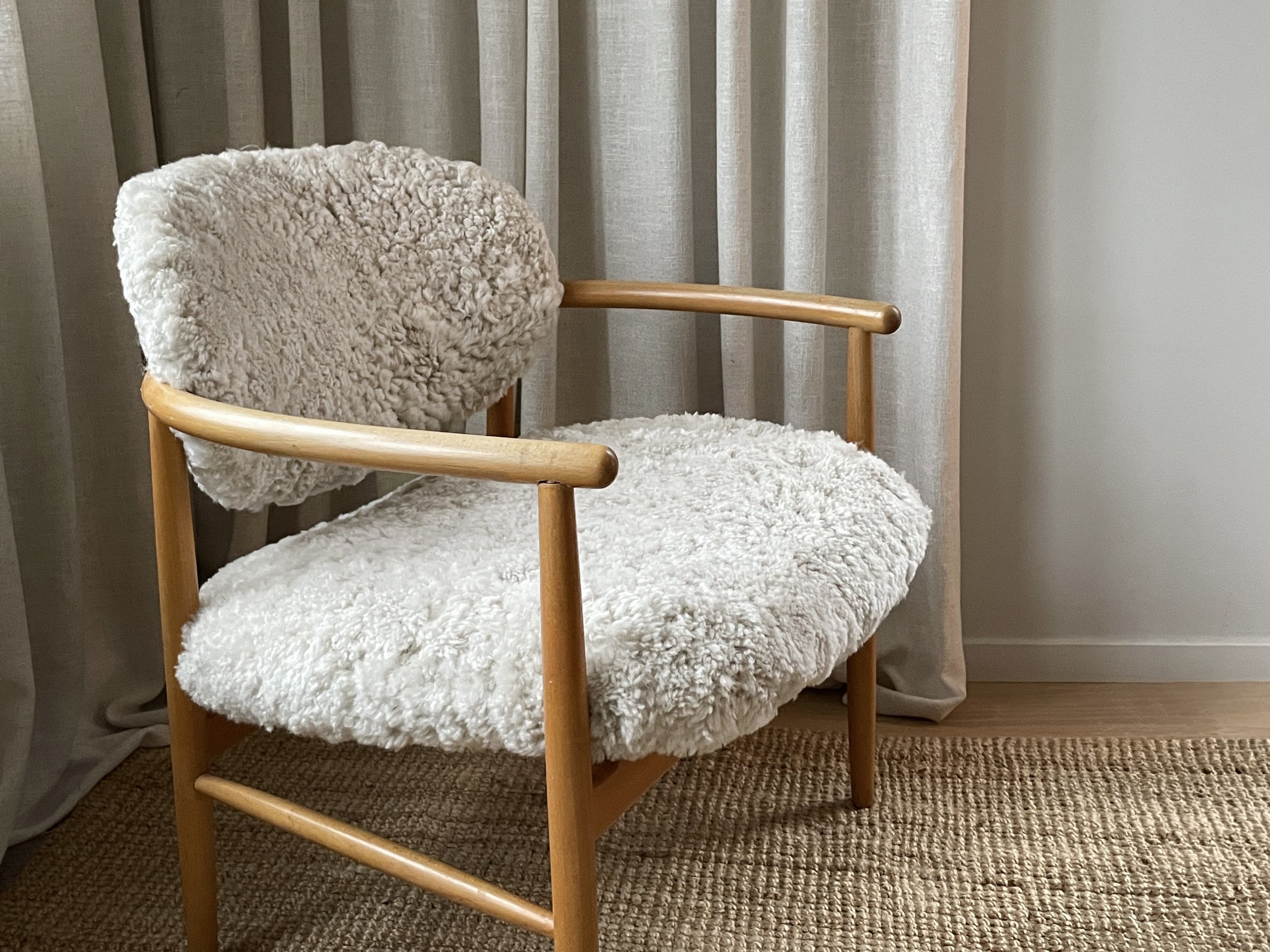 Armchair "Pluto" by Alf Svensson, dressed in sheepskin SOLD