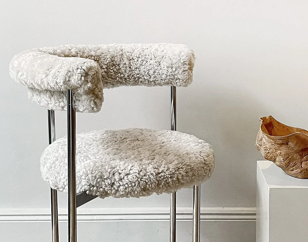 Chrome chair dressed in sheepskin