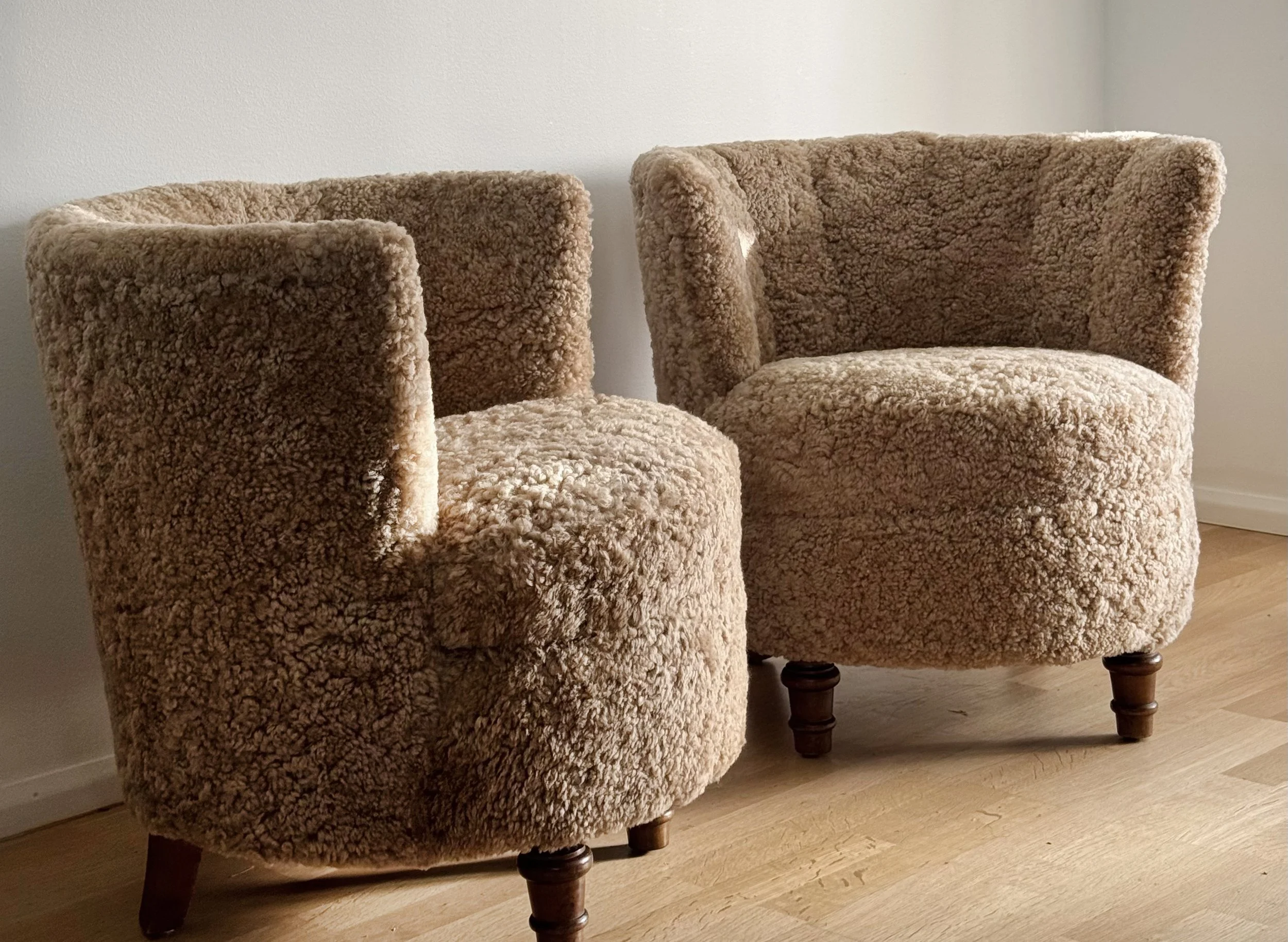 Lounge chairs dressed in sheepskin, 40s