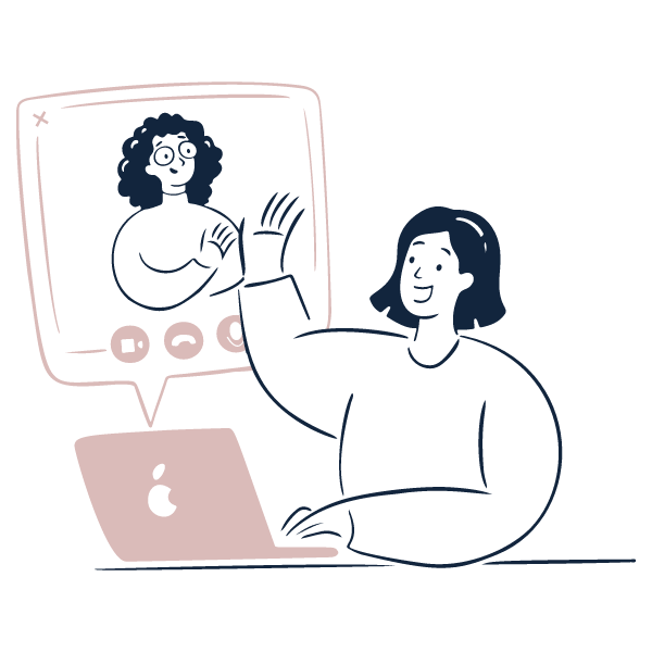A person sitting at a desk using a laptop, participating in a video call with a woman on a screen.