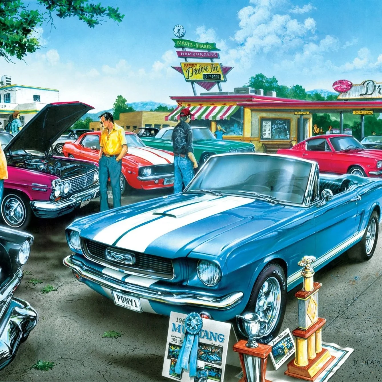 A display of classic cars at a car show, including a blue 1960s Ford Mustang with white racing stripes in the foreground, surrounded by trophies and awards. Other vintage cars and people observing are visible in the background, with a food stand and signs in the distance.