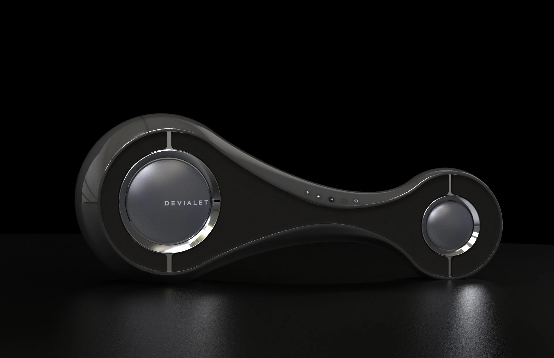 A sleek black headphone with silver accents, featuring the brand name 'DEVIALET' on the ear cup, resting on a dark surface against a black background.