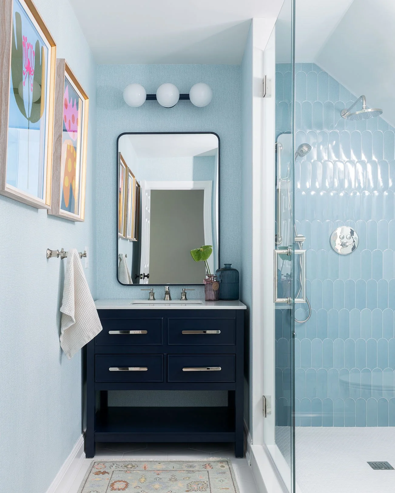 Bright and clean bathroom with blue tiles