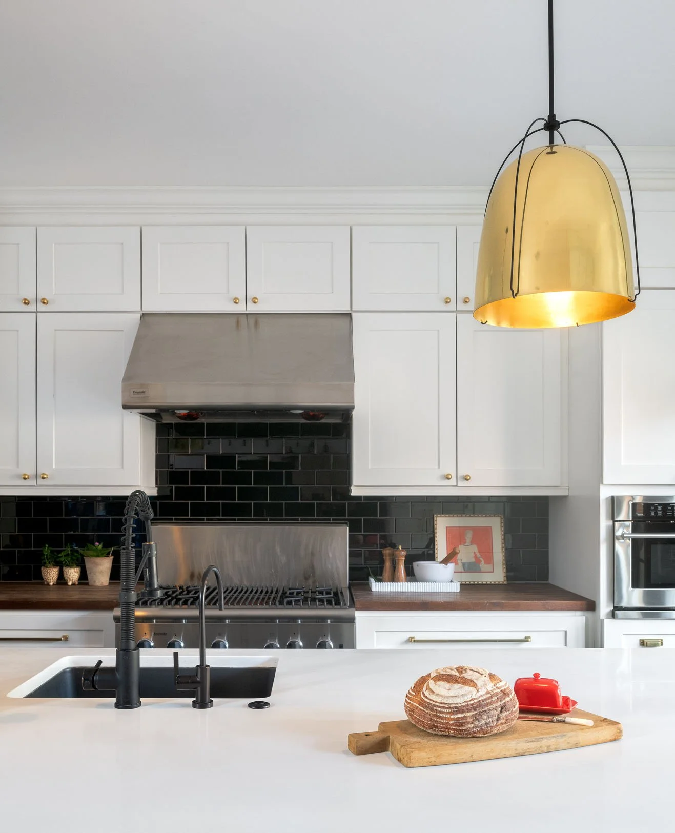 Bread and butter on the counter in a classic and modern kitchen