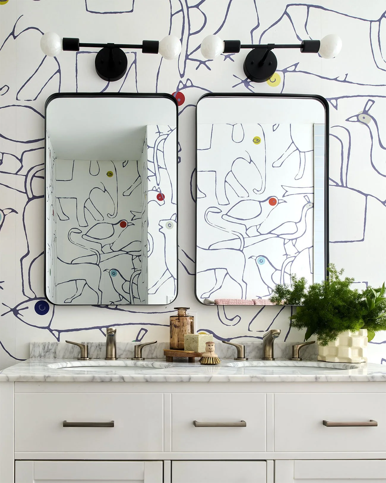Double sink vanity with modern black sconce lighting