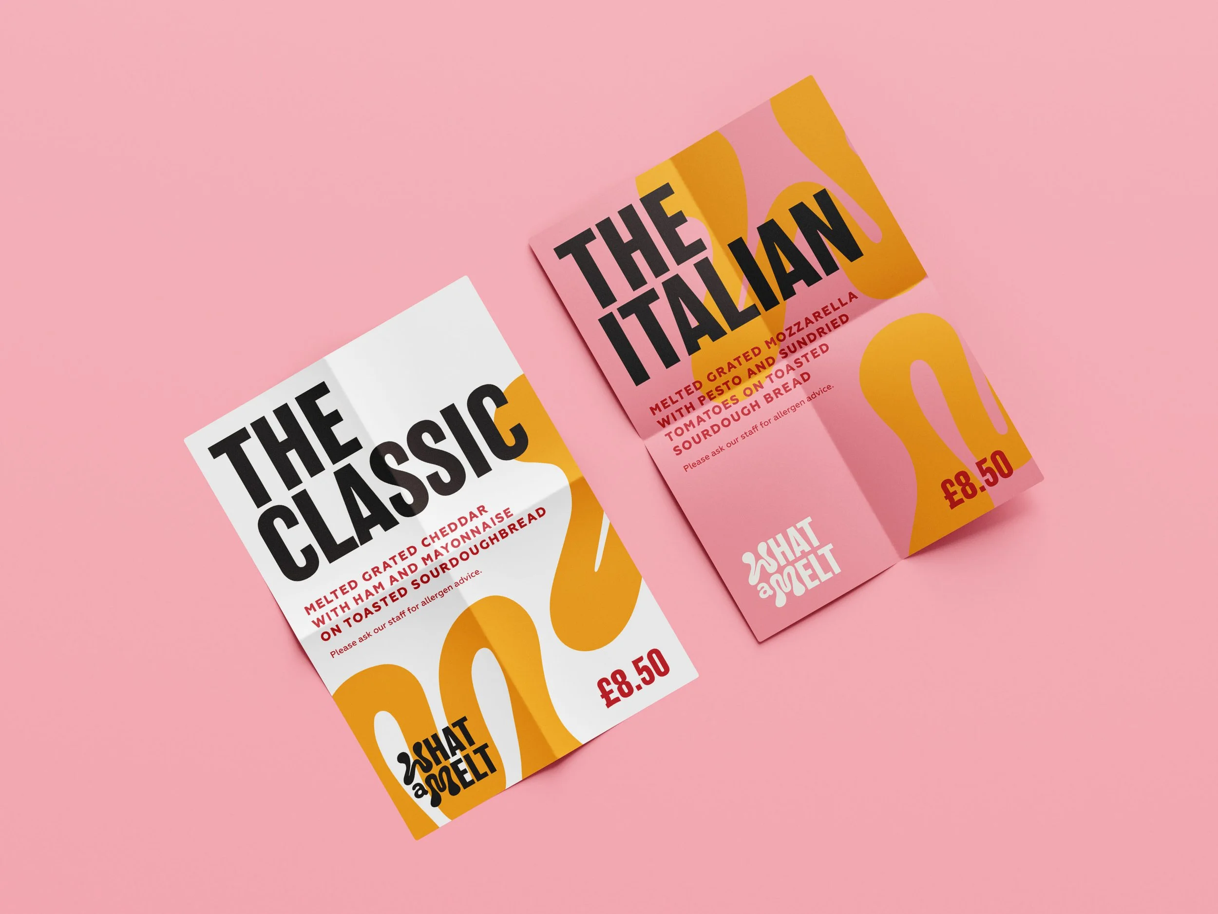 Two colorful flyers for a sandwich shop, advertising classic and italiana sandwiches. The flyers feature large bold text, abstract yellow shapes, and prices of £8.50 on a pink background.