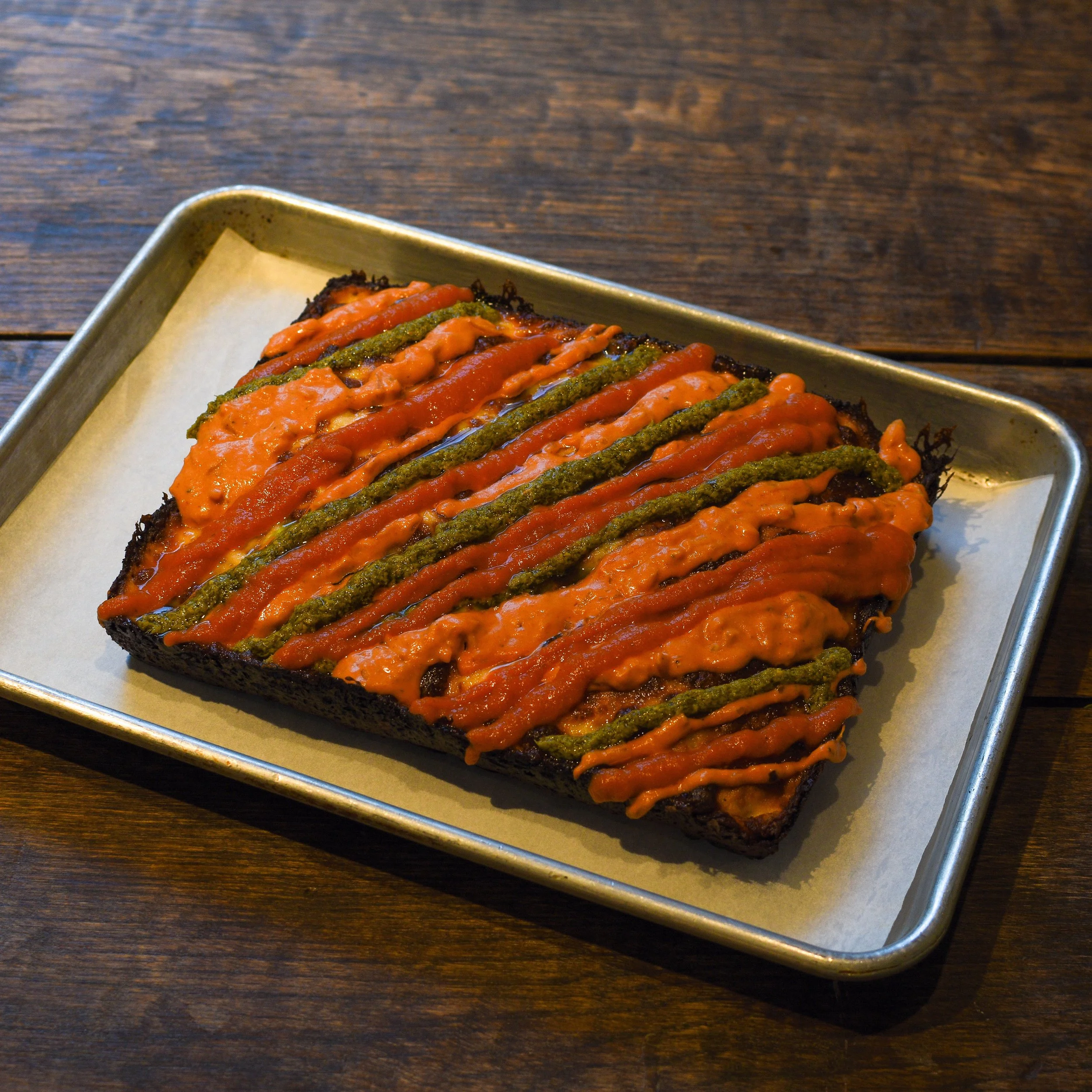 Fred's three sauce trio pizza. Pesto, marinara, and vodka sauce