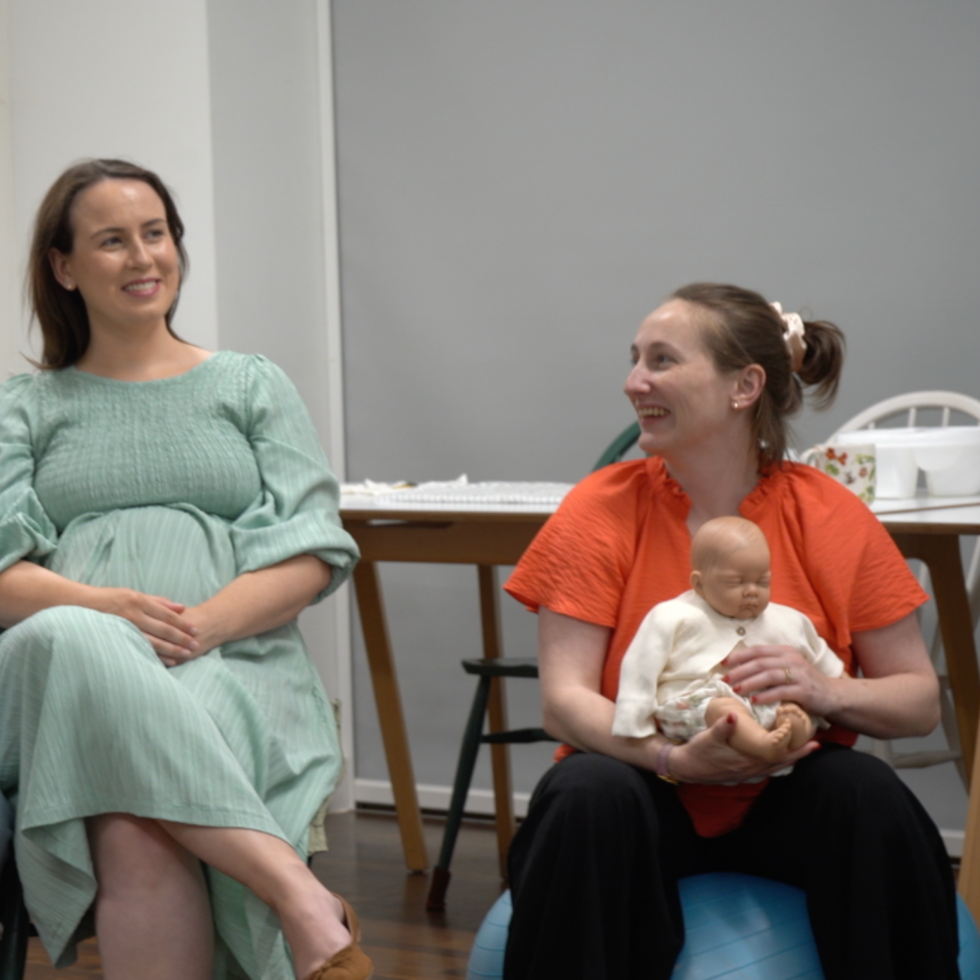 Couples learning about labour and birth at a Mindful Bump antenatal class