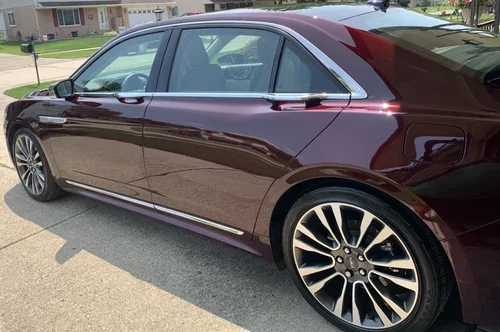 burgundy+lincoln+driver+side+back+view+supreme+wash+and+wax+and+sealant+application+jazzy+fresh+mobile+detailing.webp