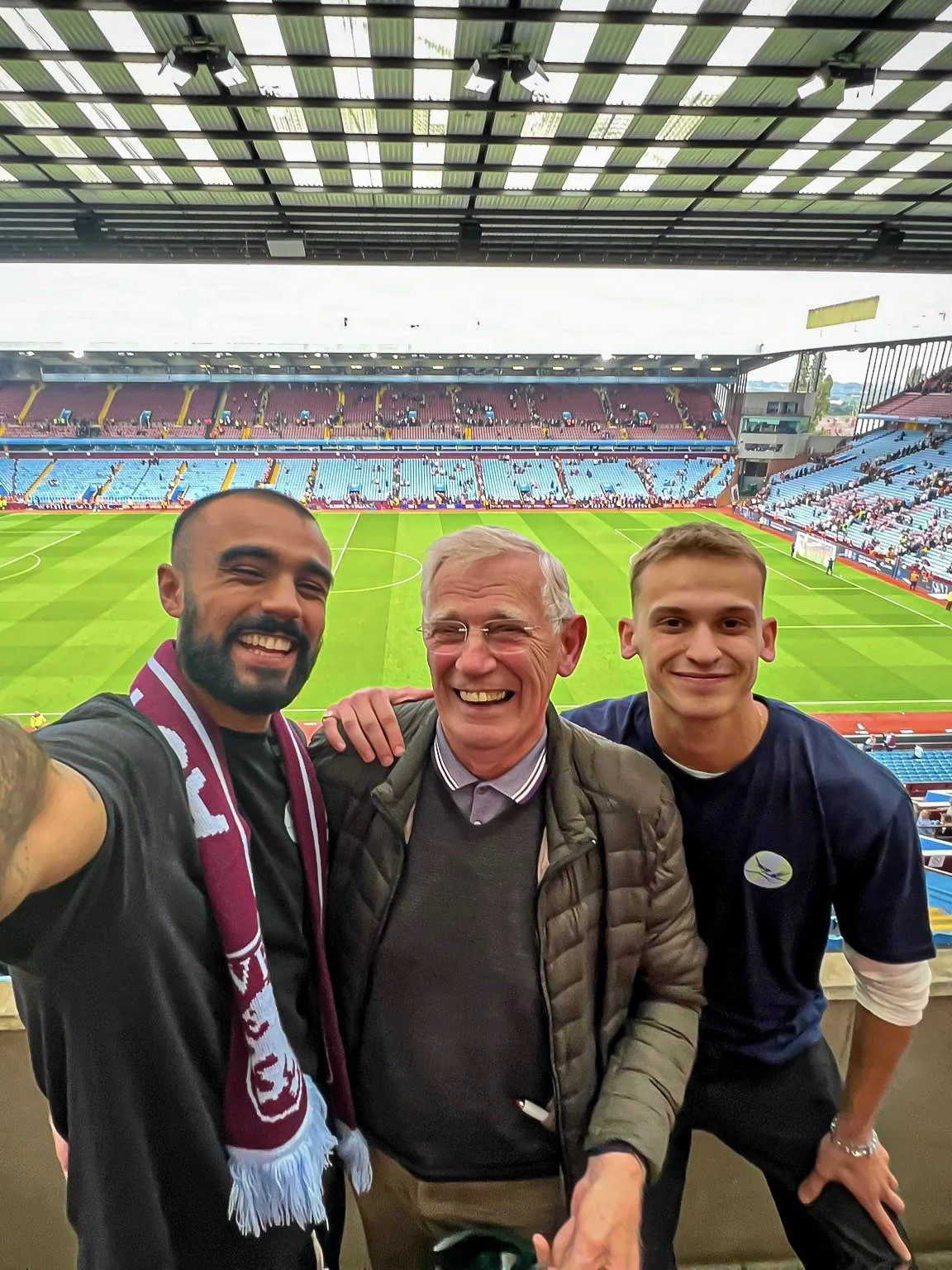 Rohan and Tom from The Mission Planet CIC with Rohan’s grandfather at Villa Park, home of Aston Villa Football Club.