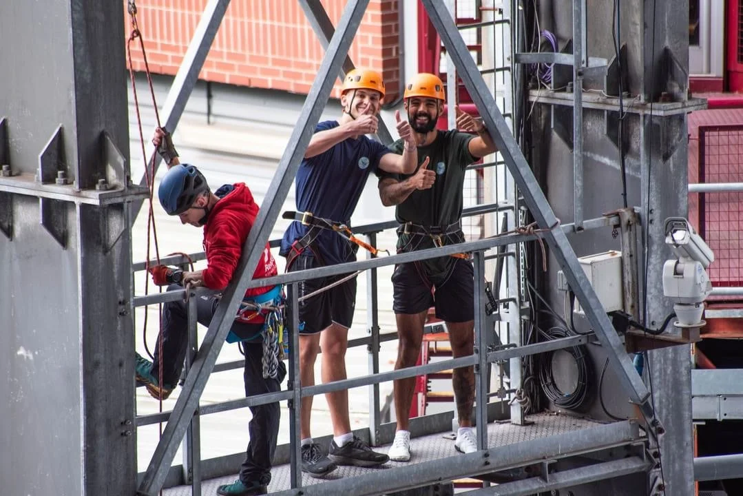 Tom and Rohan abseiling at Villa Park to support the Aston Villa Foundation as part of a Mission Planet fundraising challenge