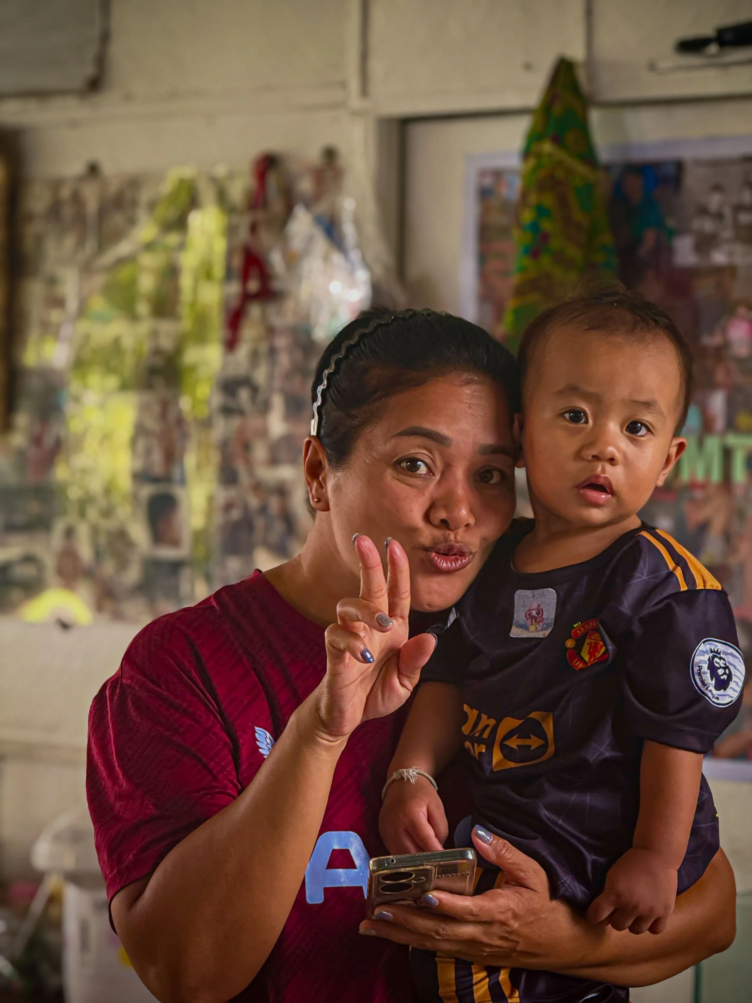 A local community member and child during a visit in Thailand as part of The Mission Planet CIC’s animal welfare initiatives.