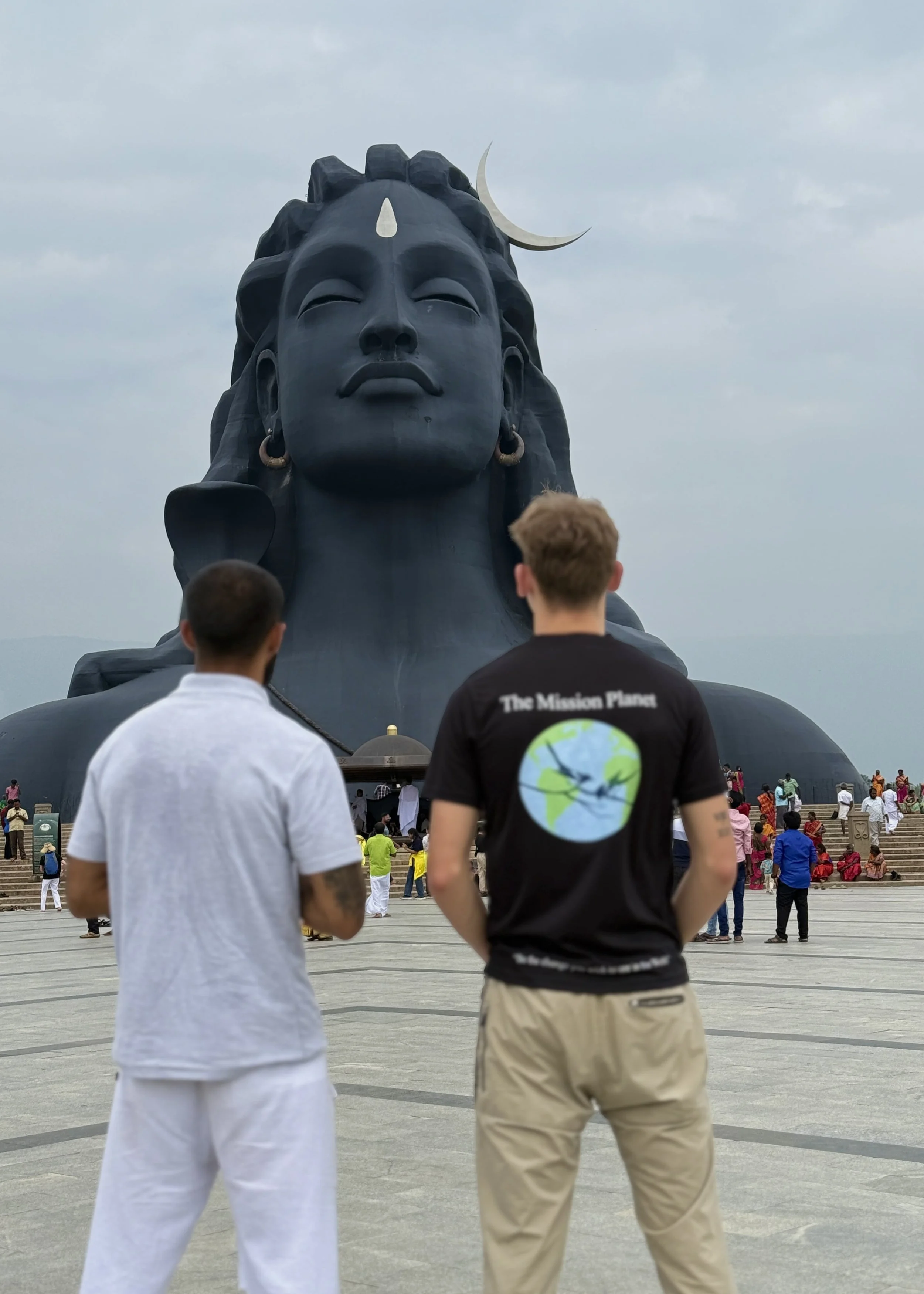 Rohan and Tom in India during a Mission Planet animal welfare mission, pictured at Bahubali Hill while supporting street dog rescue efforts