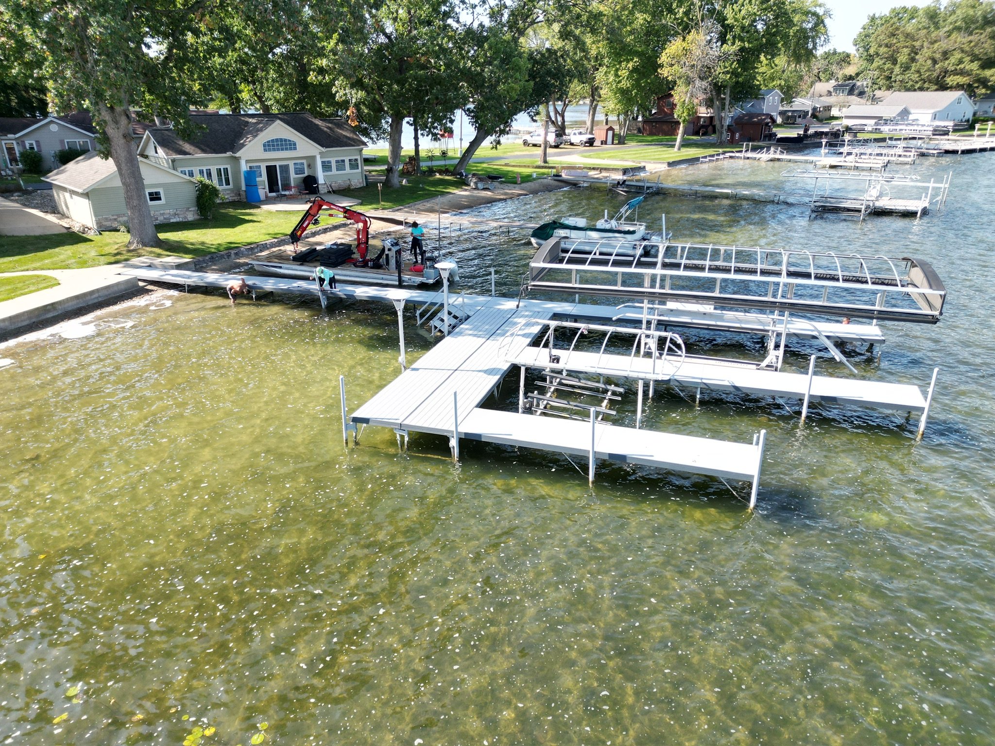 Designing a Dock for Pontoon Boats, Wake Boats, and PWCs on One Michigan Lake Setup