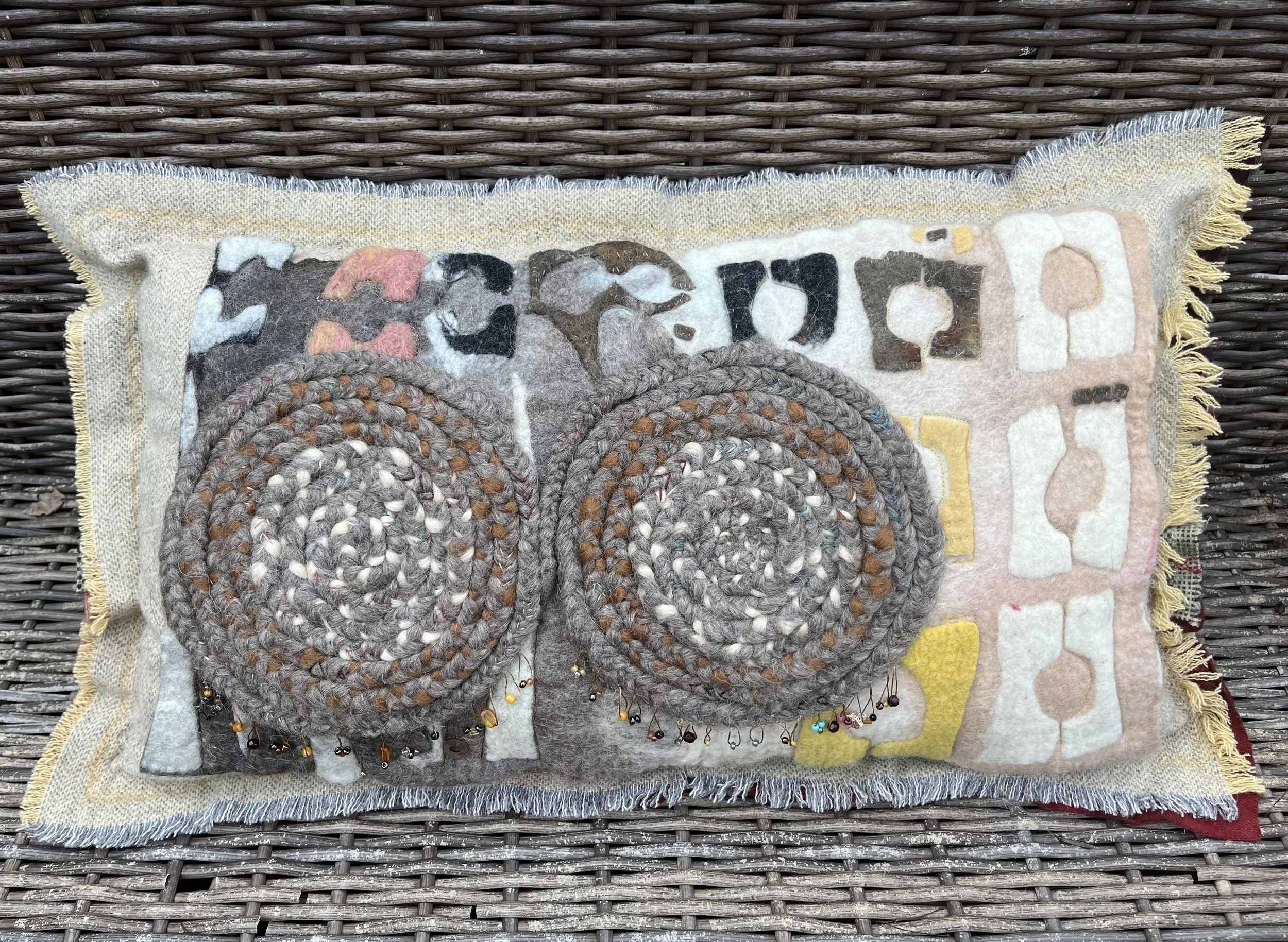 womb tomb eyes pillow 2023
plant dyed, felted and plaited wool
hand stitching in cotton and silk
recycled textile
28"15"x4"